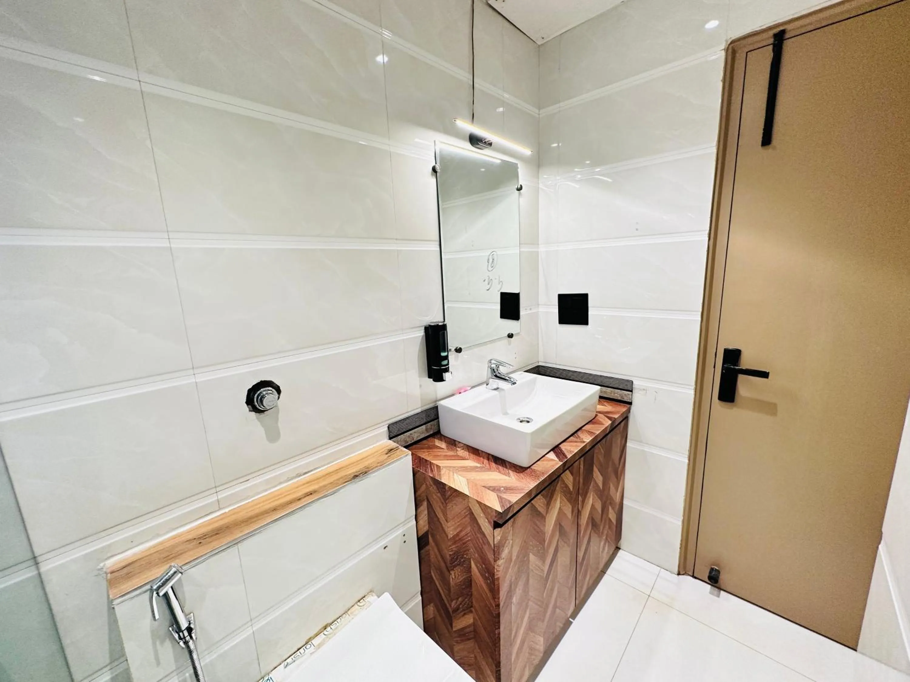 Bathroom in Hotel IP Swarn near Anand Vihar Vaishali Ghaziabad