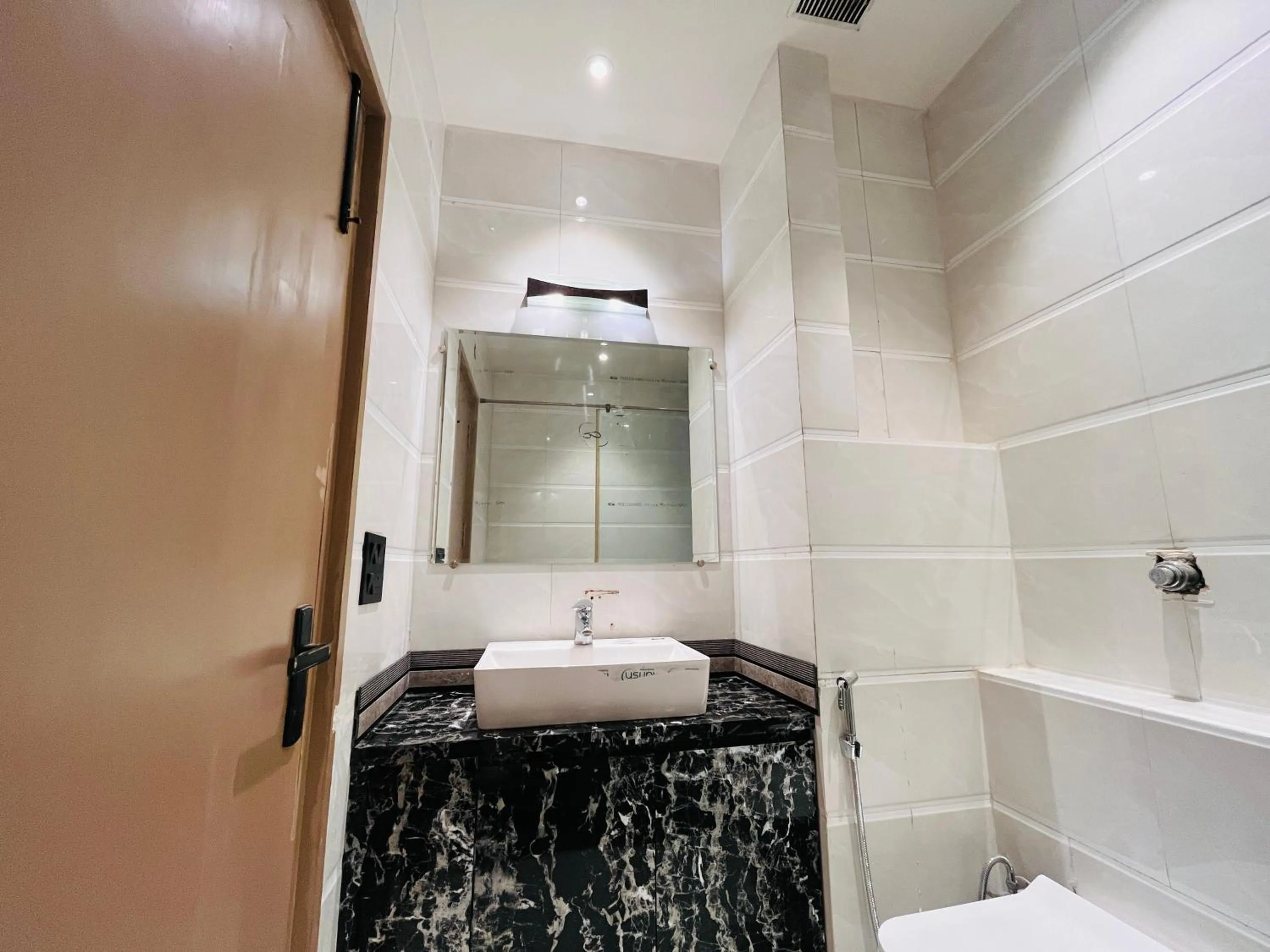 Shower in Hotel IP Swarn near Anand Vihar Vaishali Ghaziabad