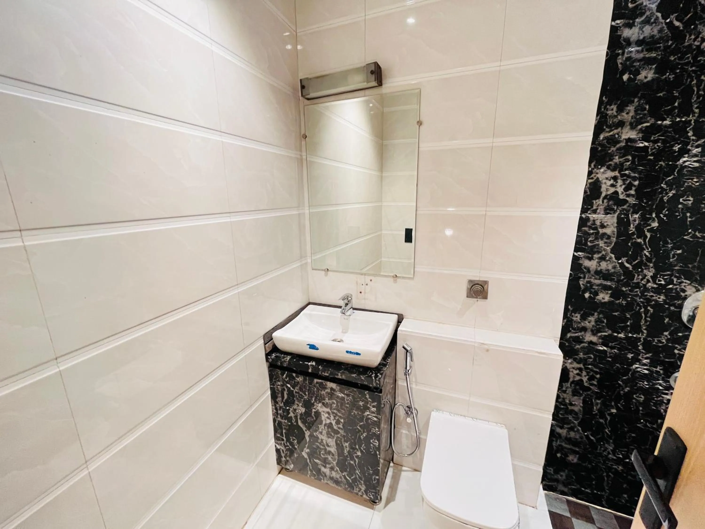 Bathroom in Hotel IP Swarn near Anand Vihar Vaishali Ghaziabad