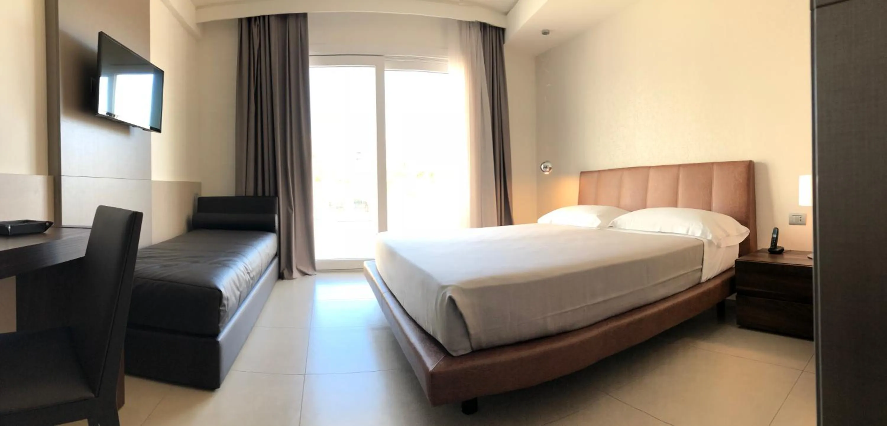 Bed in Hotel Vespucci