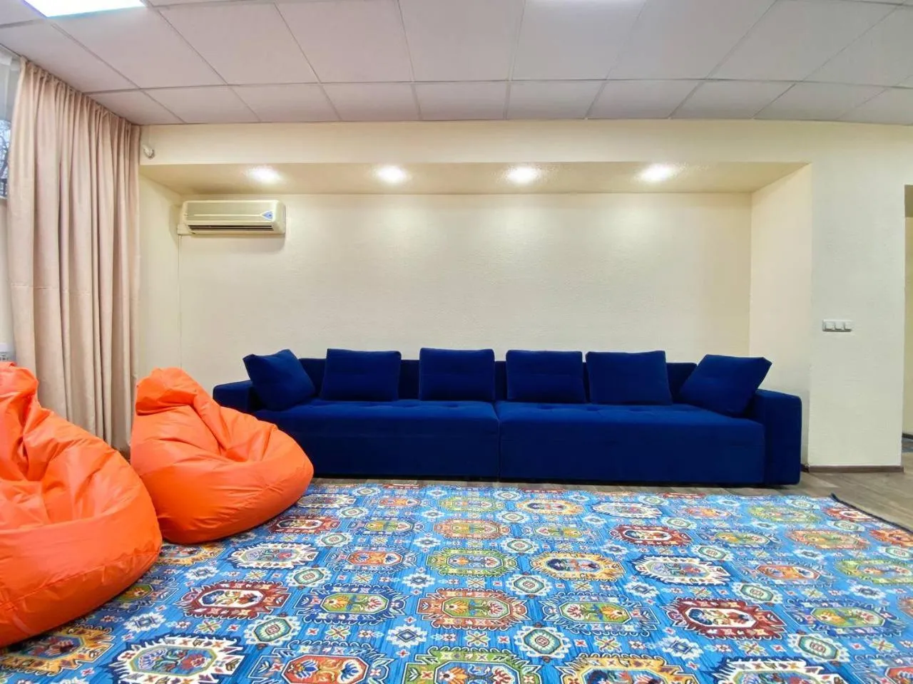 Communal lounge/ TV room in Alma-Ata Hostel