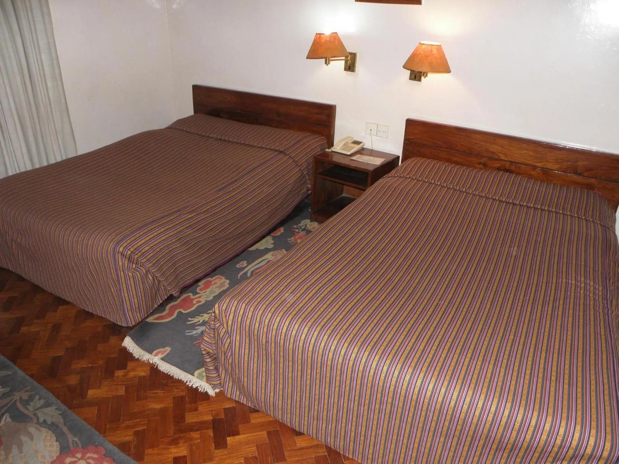 Bed in Vajra Hotel