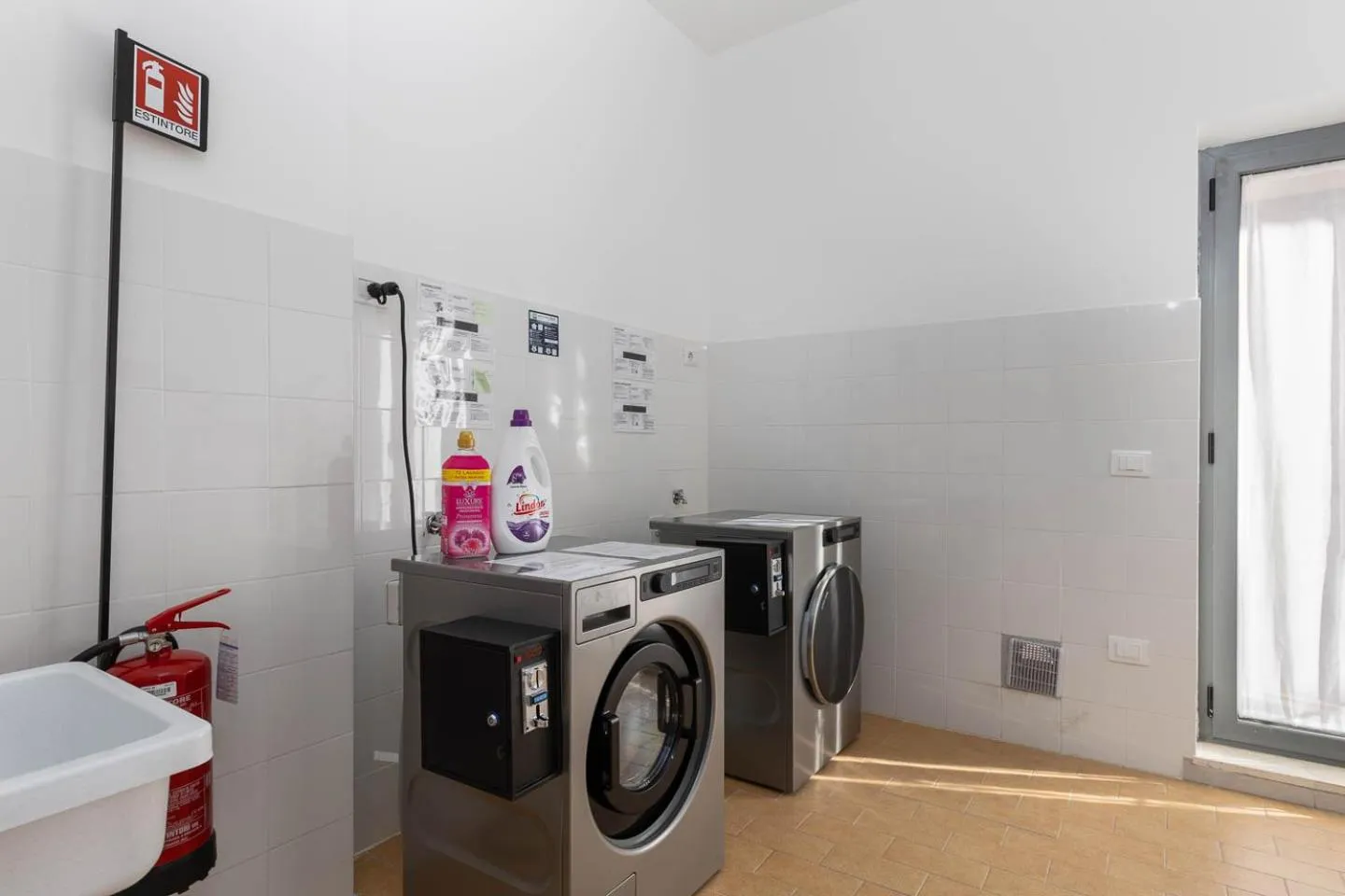 laundry in Tuscasì Aparthotel