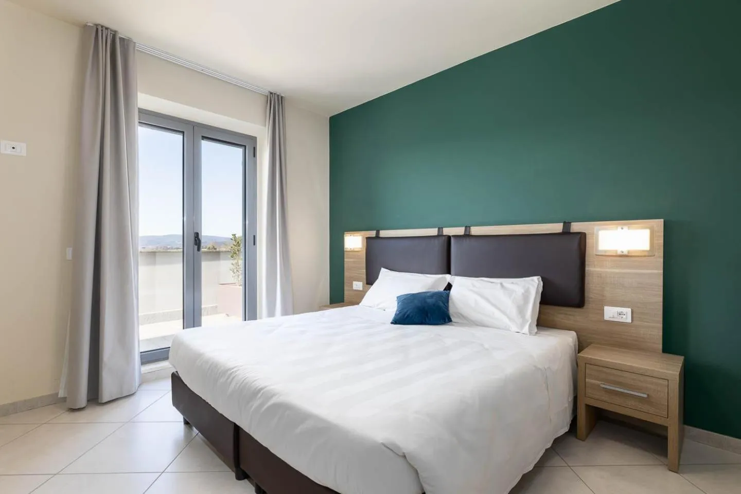 Bed in Tuscasì Aparthotel