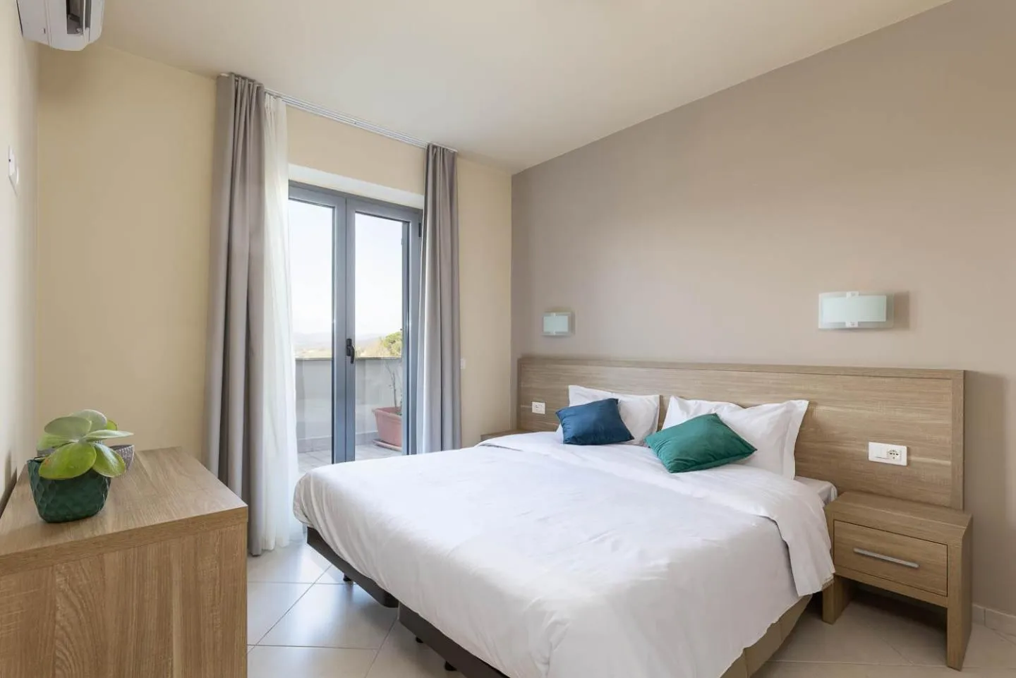 Bed in Tuscasì Aparthotel