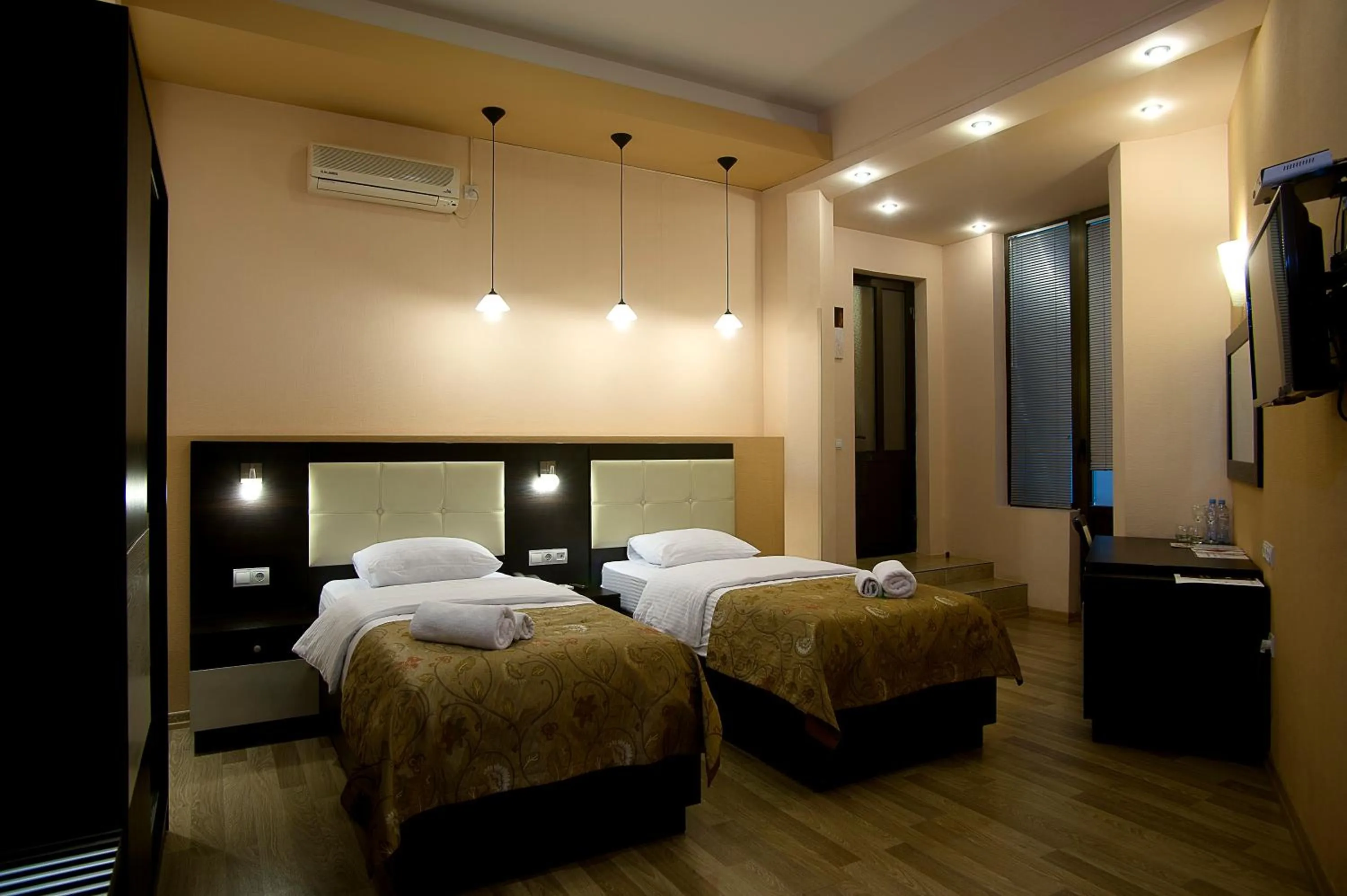 Bedroom in Coral Boutique Hotel