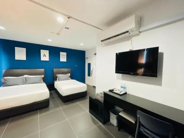 Bed in Halo Rooms Hotel