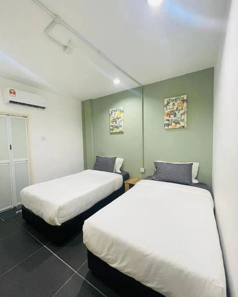 Bed in Halo Rooms Hotel