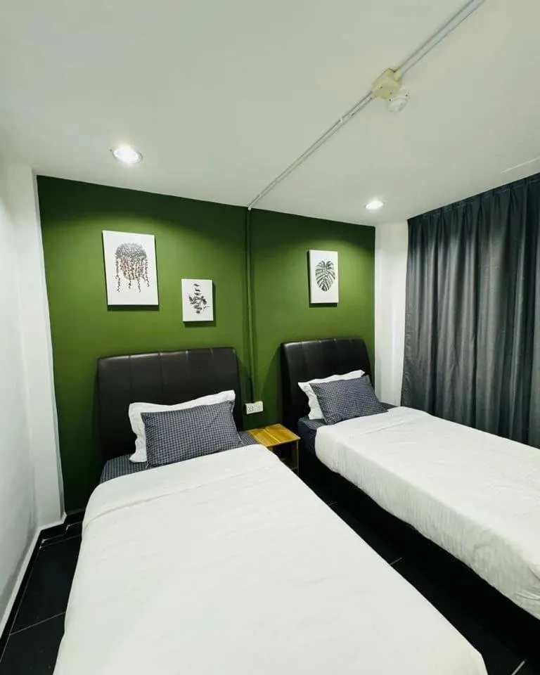 Bed in Halo Rooms Hotel