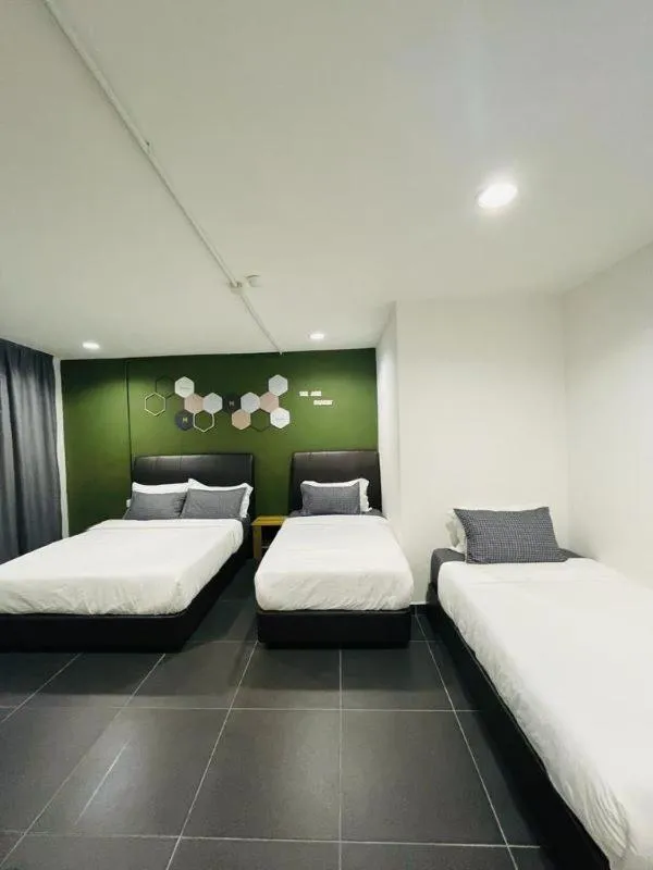 Bed in Halo Rooms Hotel