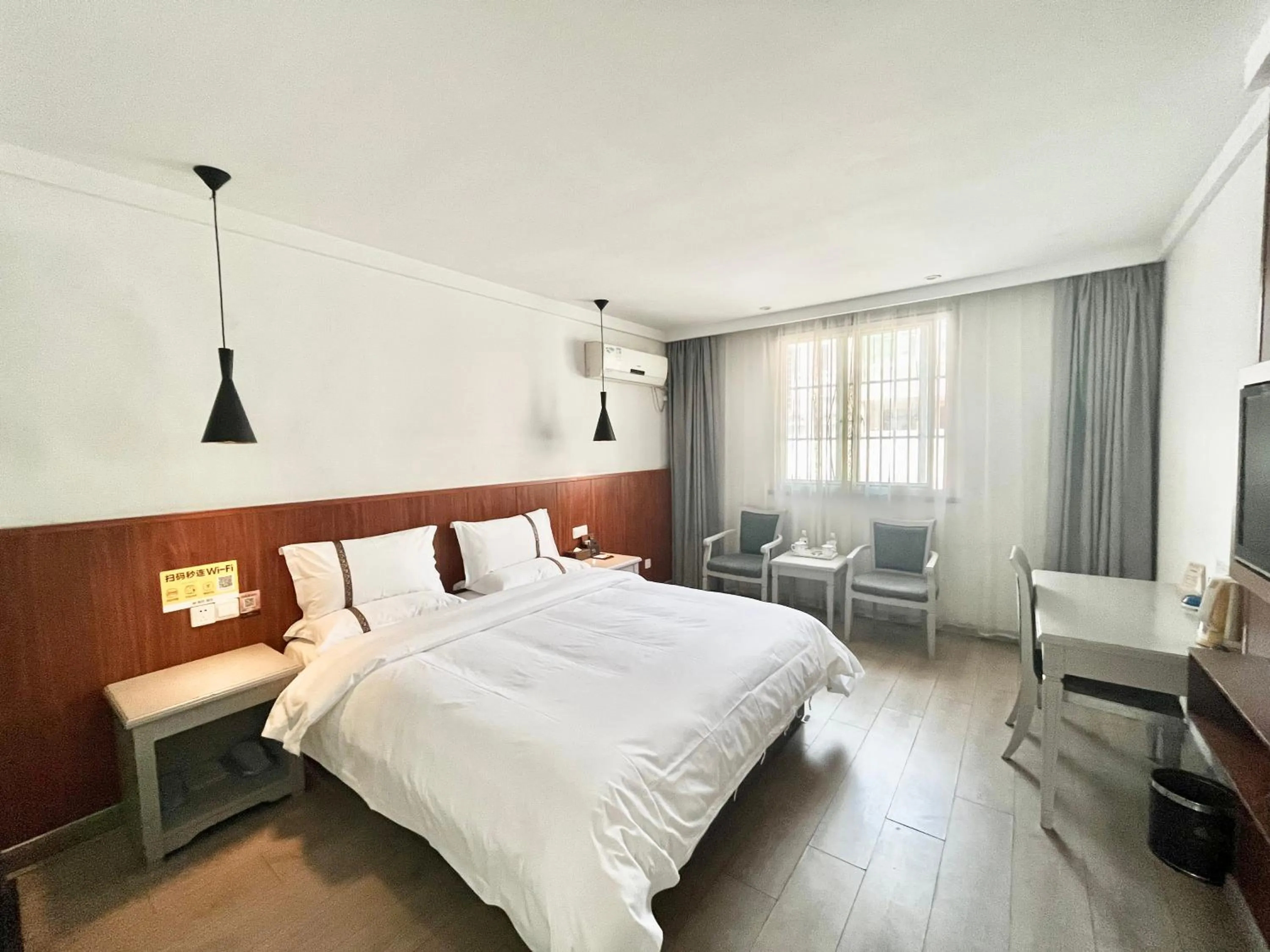 Bed in Tianshui Times Hotel Zhangjiagang