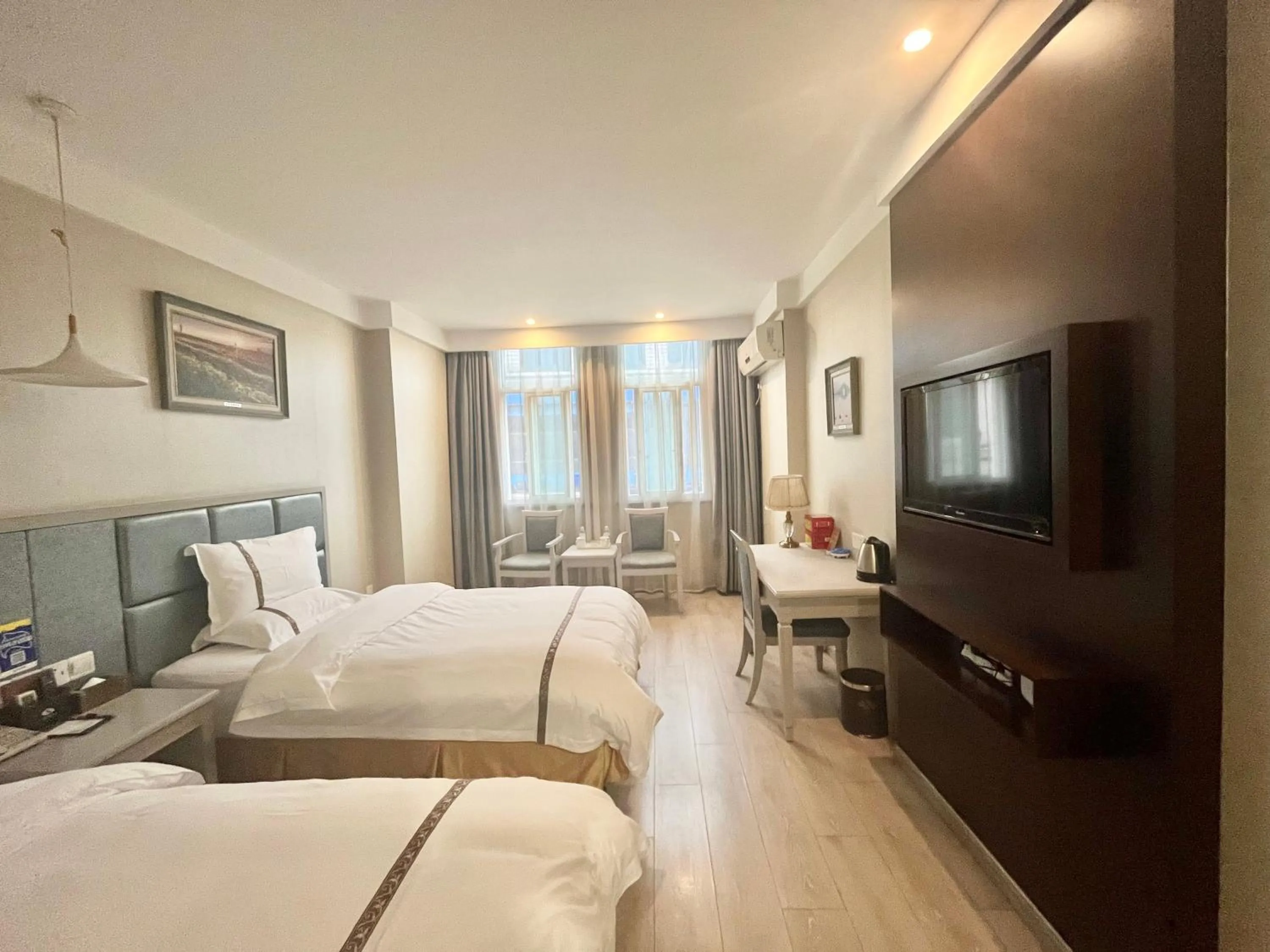 Communal lounge/ TV room in Tianshui Times Hotel Zhangjiagang