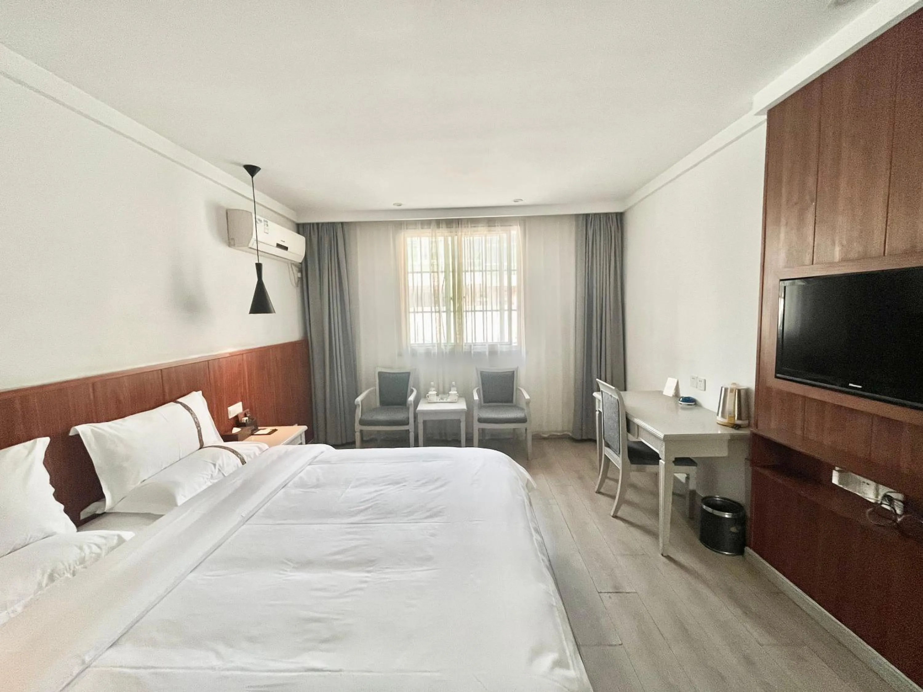 Bed in Tianshui Times Hotel Zhangjiagang