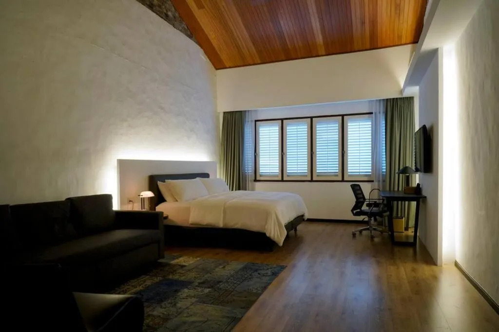 Bed in Quint Residence, Georgetown - Rustic Heritage Guesthouse by ALV