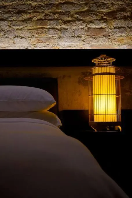 Bed in Quint Residence, Georgetown - Rustic Heritage Guesthouse by ALV