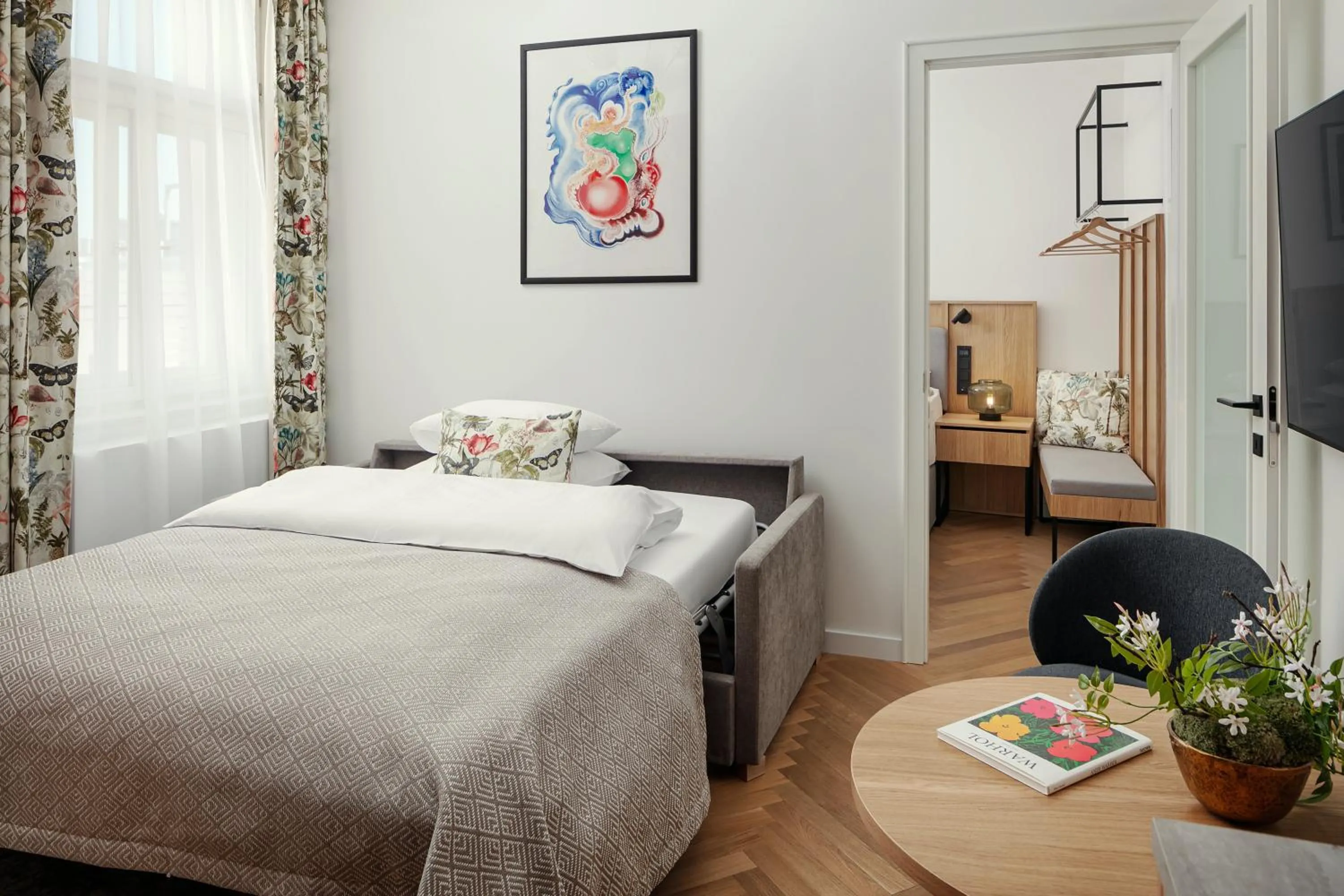 Living room, Bed in R16 Residences Prague