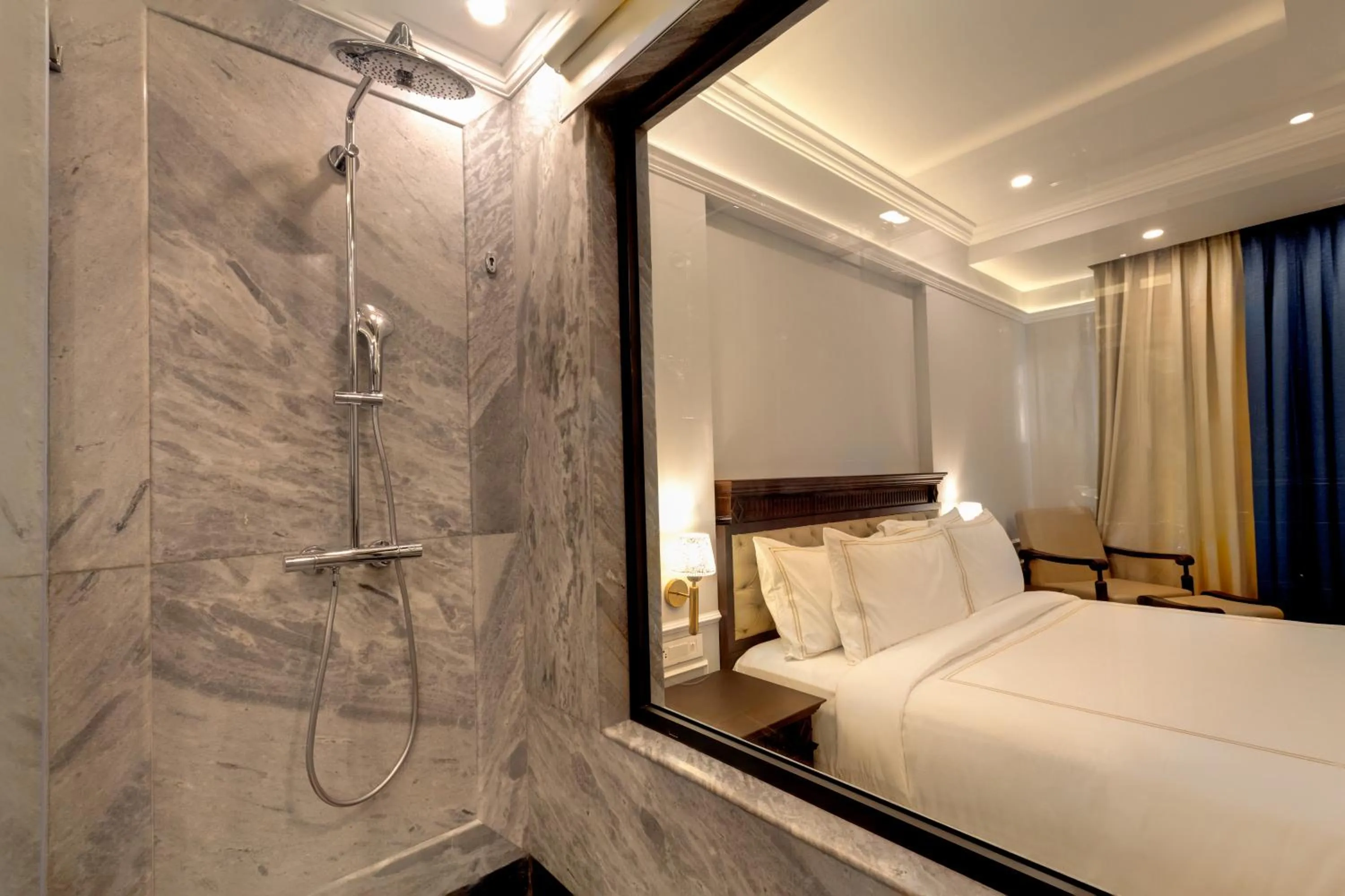Shower, Bed in Ramada by Wyndham Goa Vagator