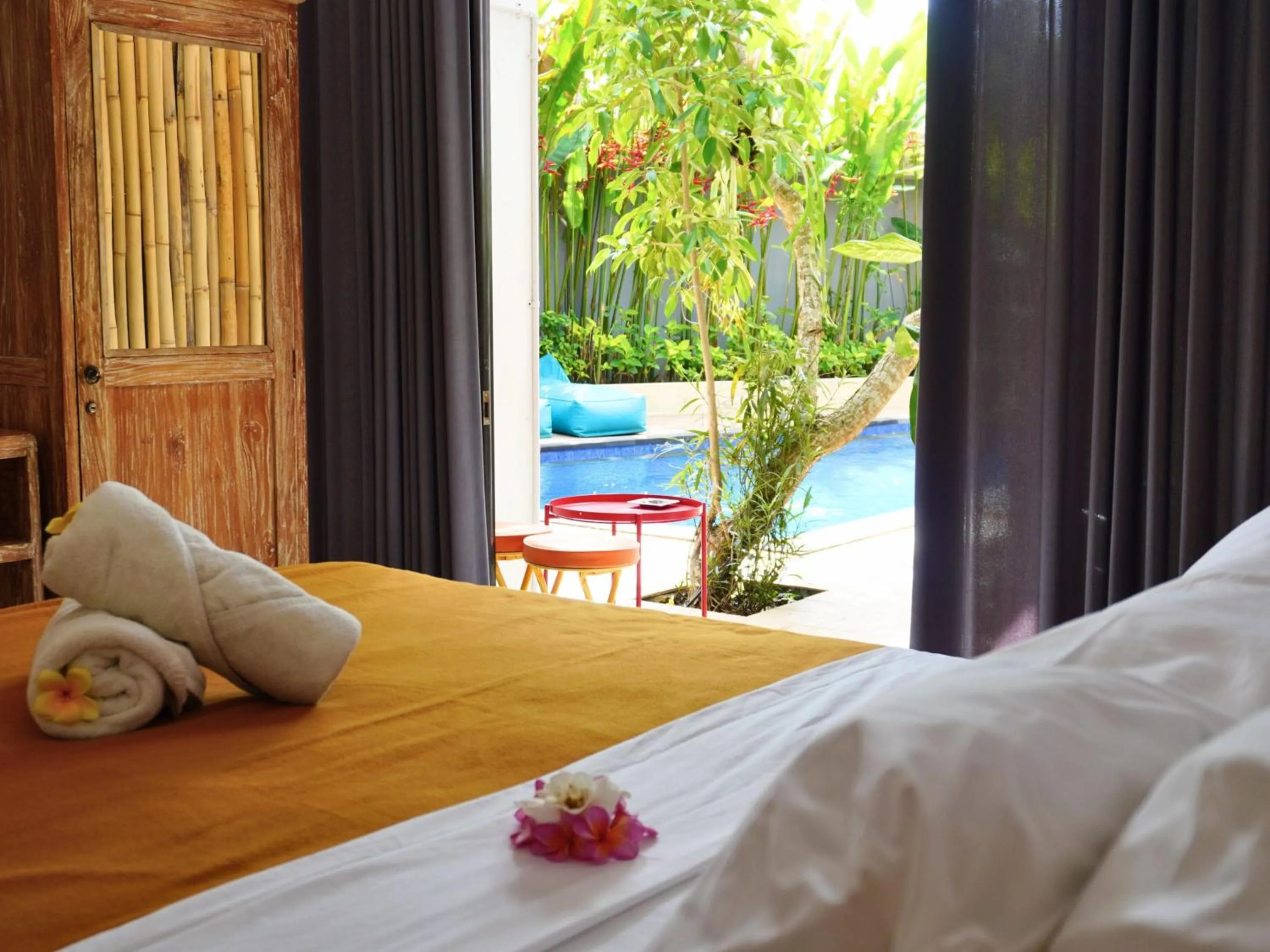 Double Room with Pool View - single occupancy in Summer of Surf Hostel Ungasan Uluwatu