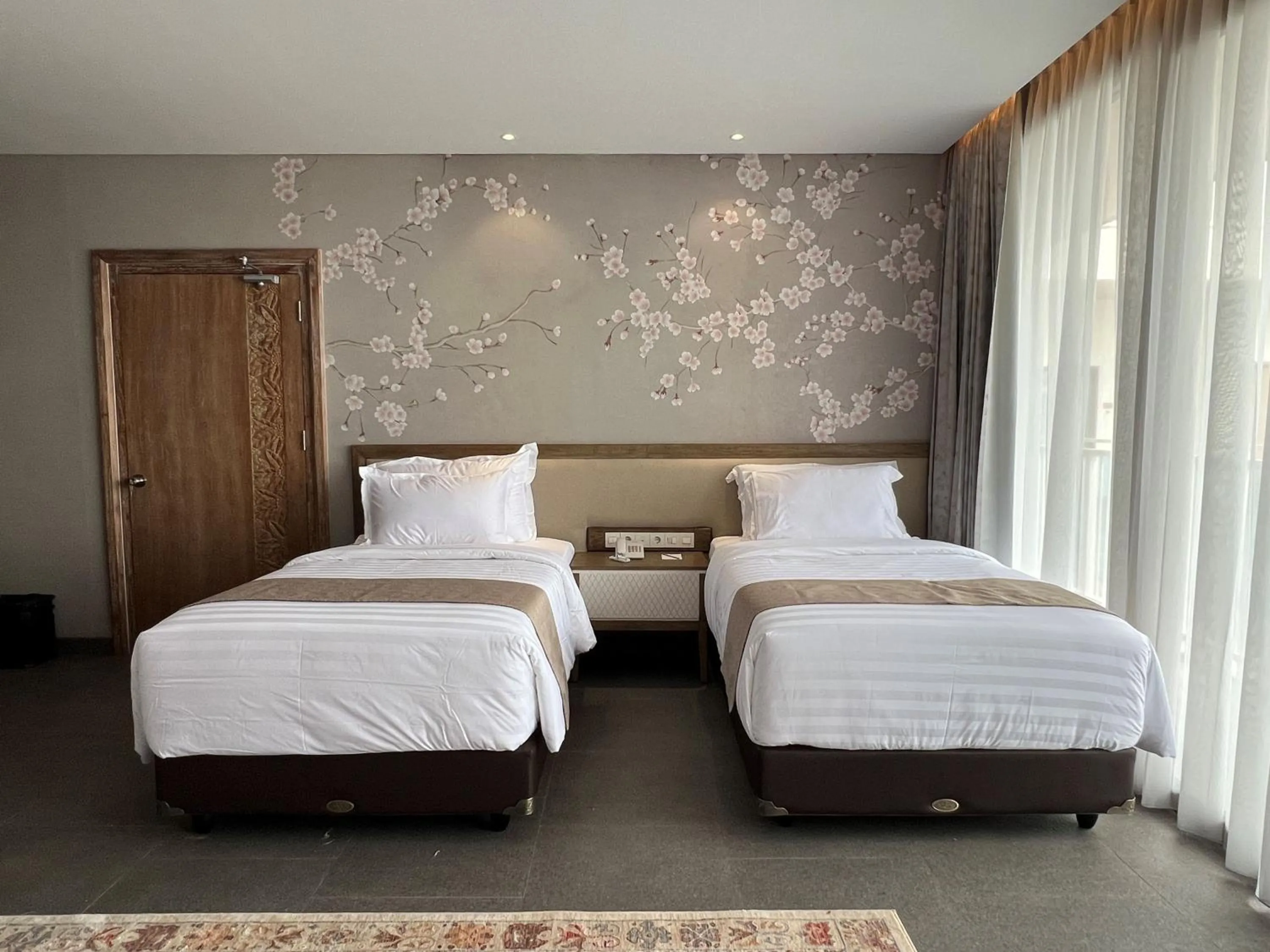 Bed in Tabebuya Resto & Resort