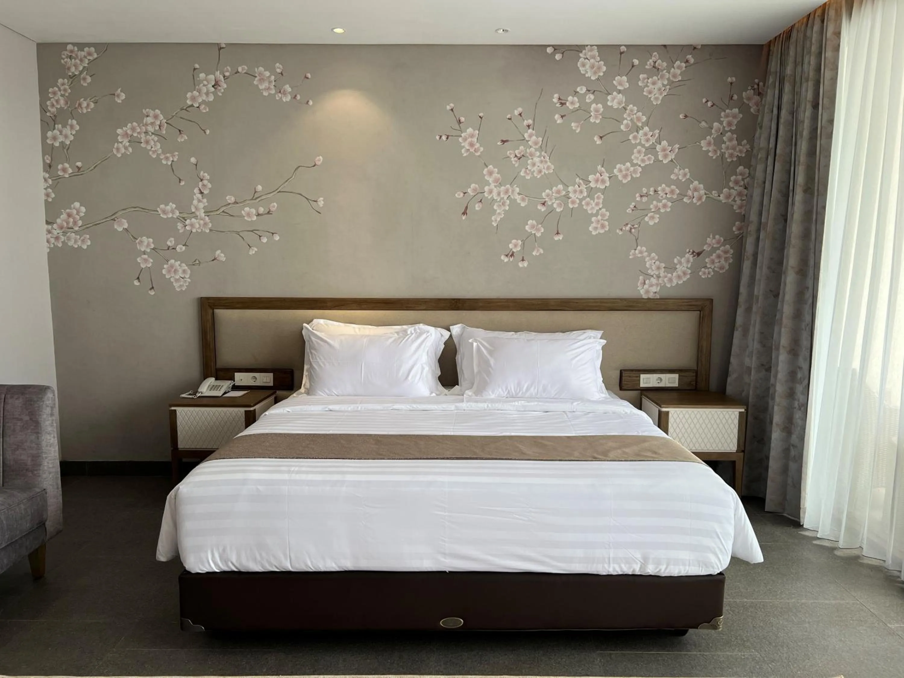 Bed in Tabebuya Resto & Resort