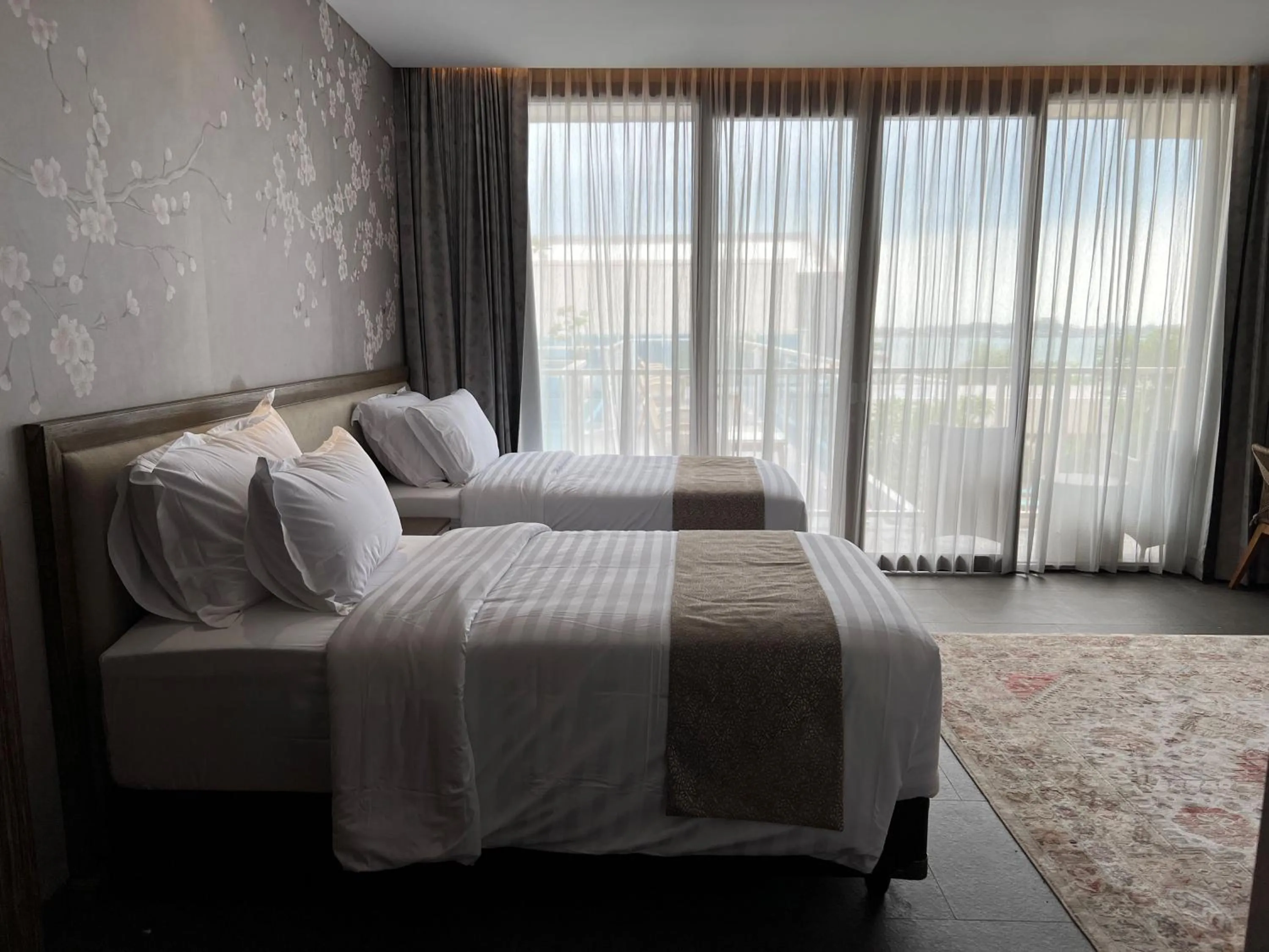 Bed in Tabebuya Resto & Resort