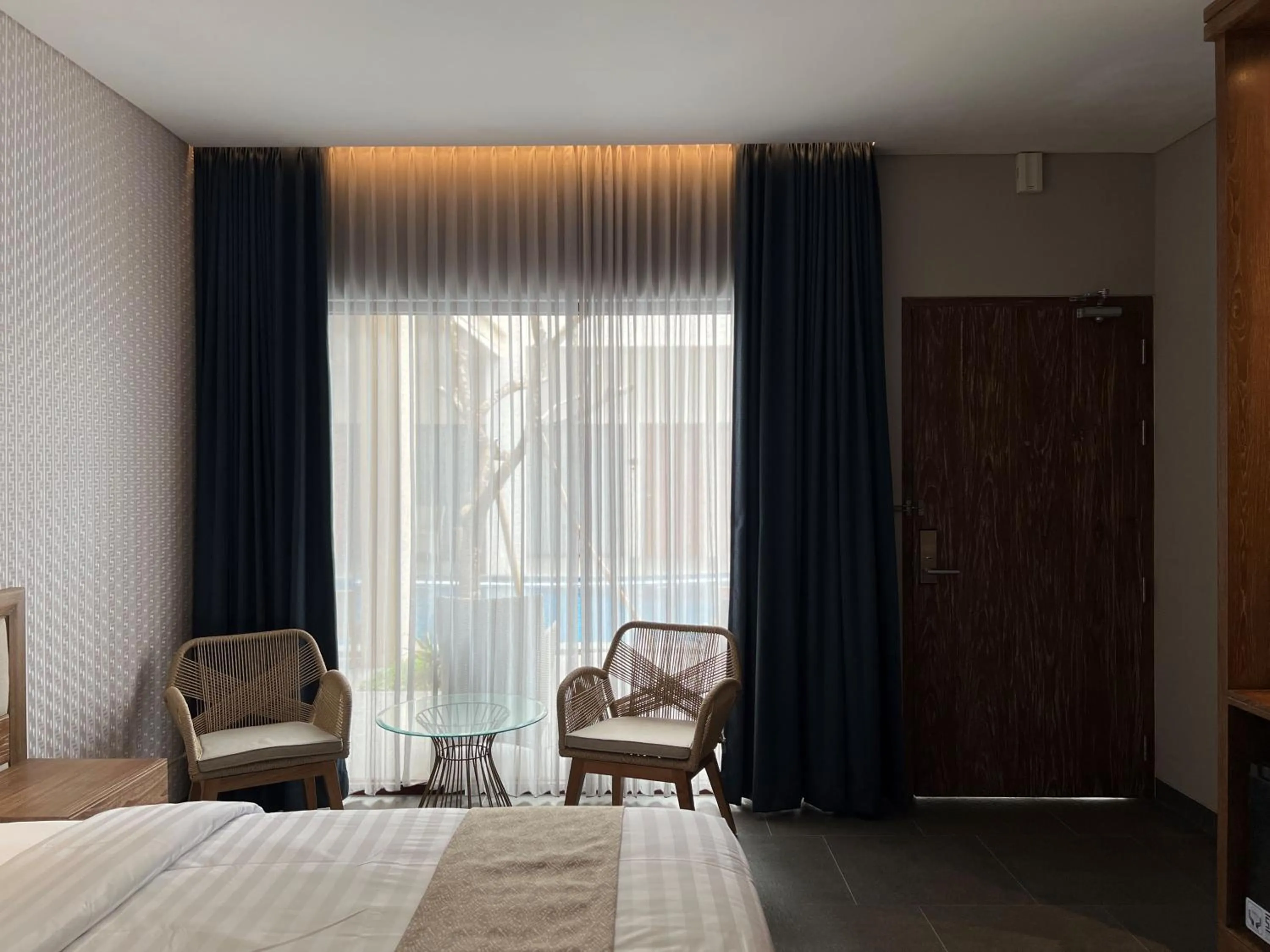 Bed in Tabebuya Resto & Resort