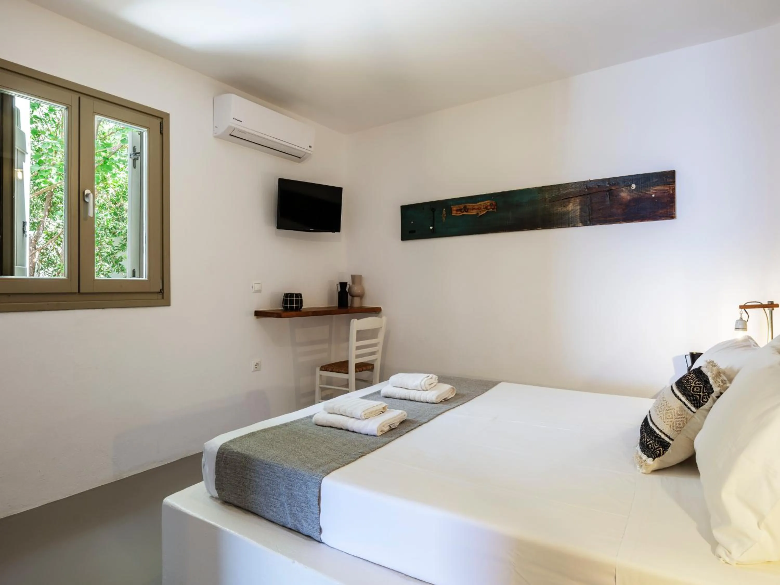 Bed in Mykonos Residence Villas & Suites Merchia beach