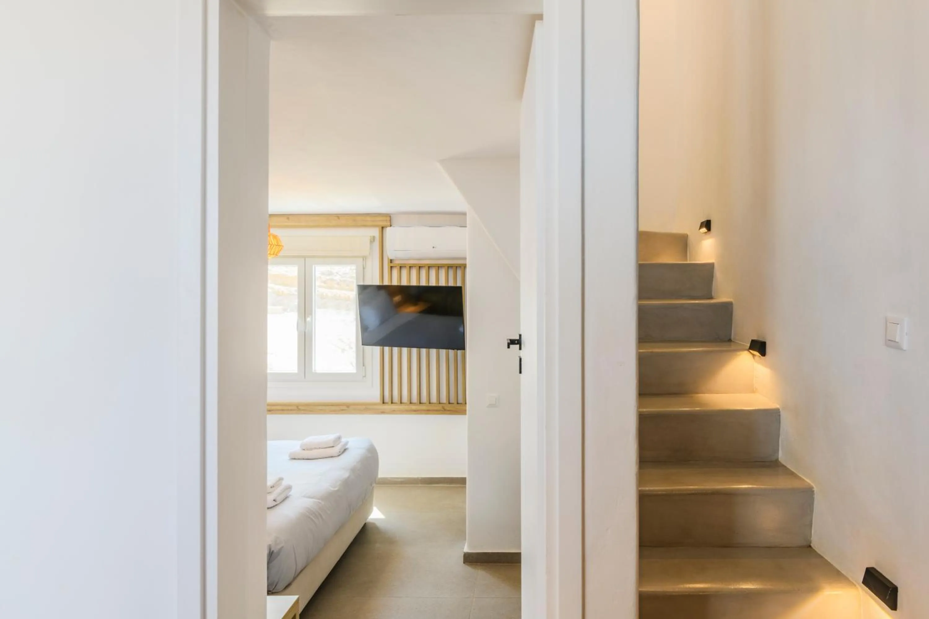 Bed in Mykonos Residence Villas & Suites Merchia beach