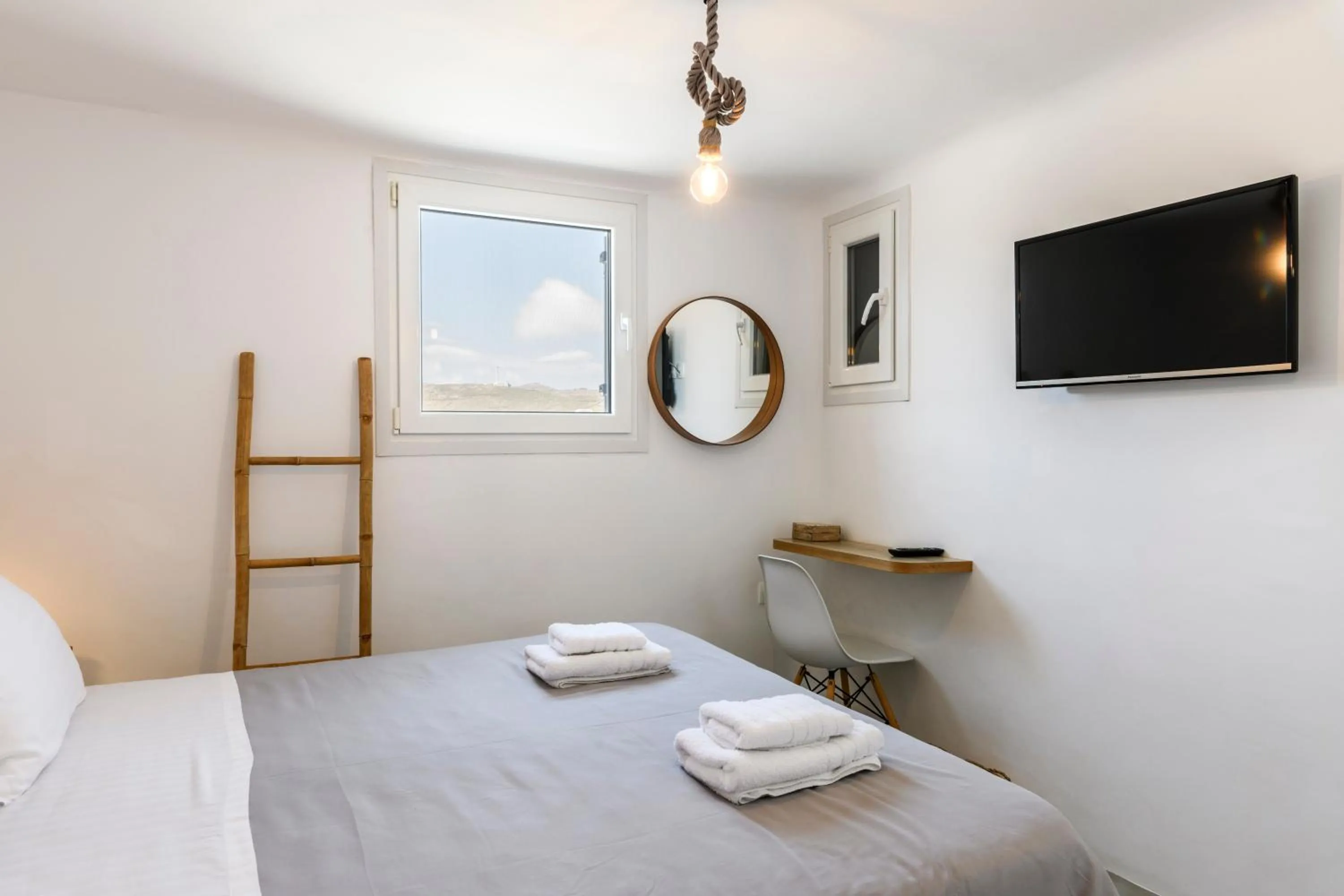 Bed in Mykonos Residence Villas & Suites Merchia beach