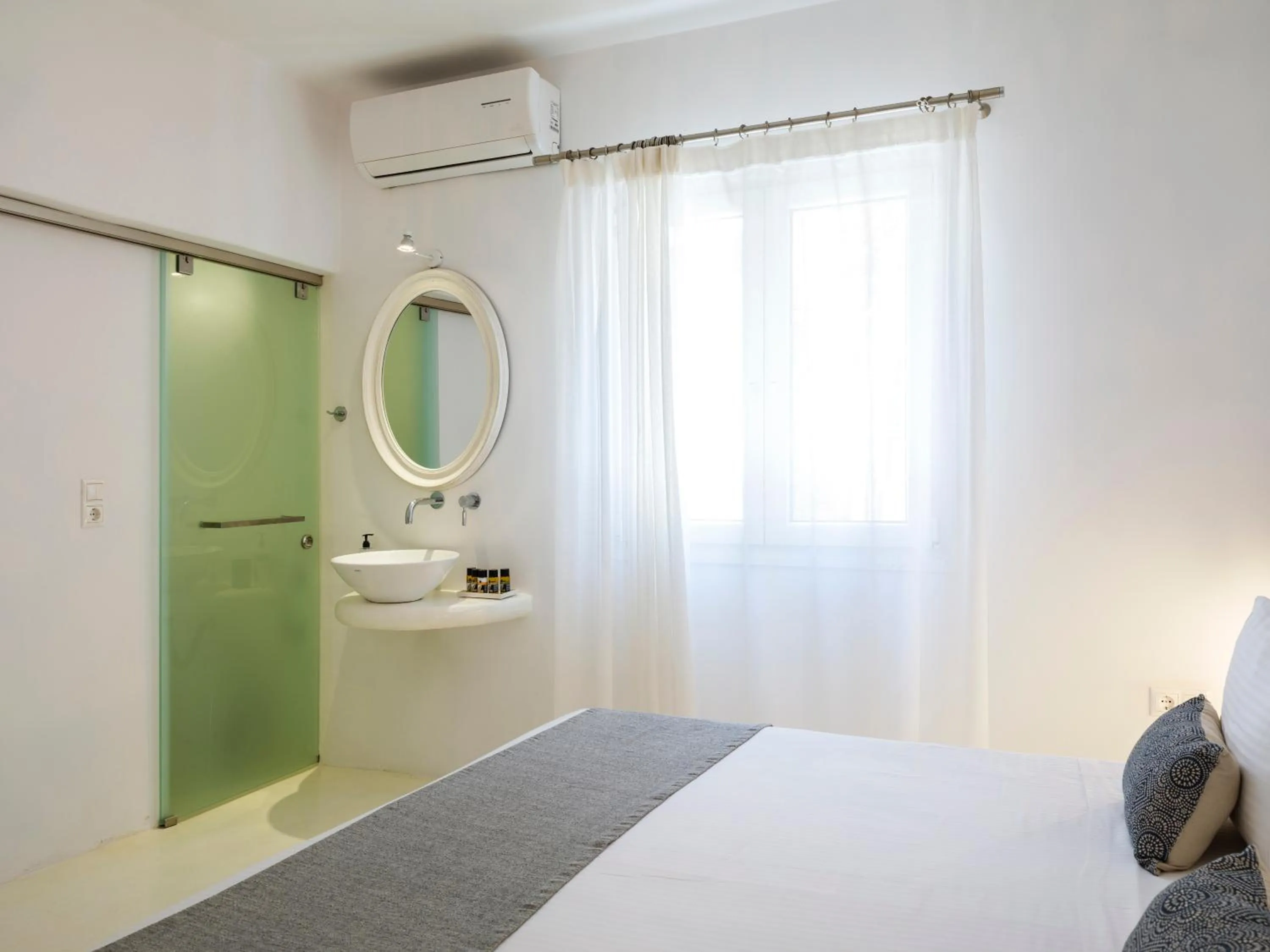 Bed in Mykonos Residence Villas & Suites Merchia beach