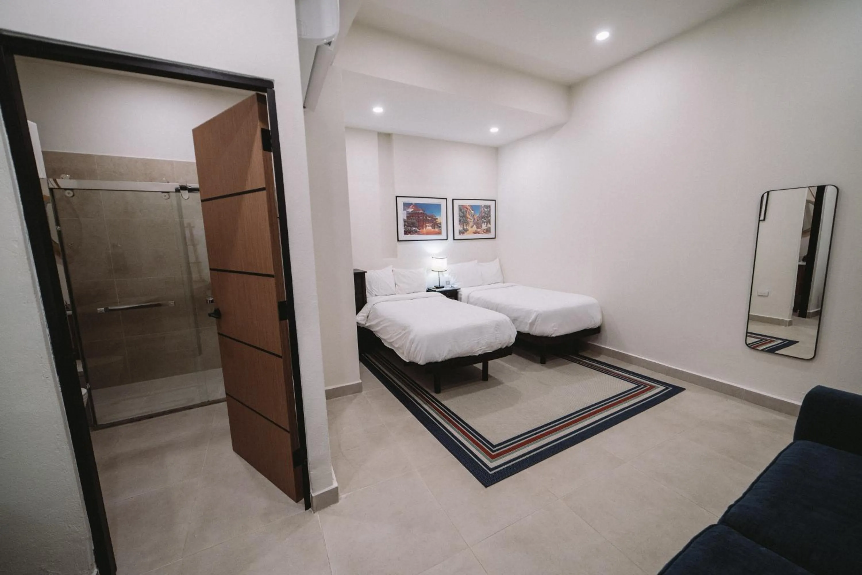 Bed in The Looking Glass Hotel