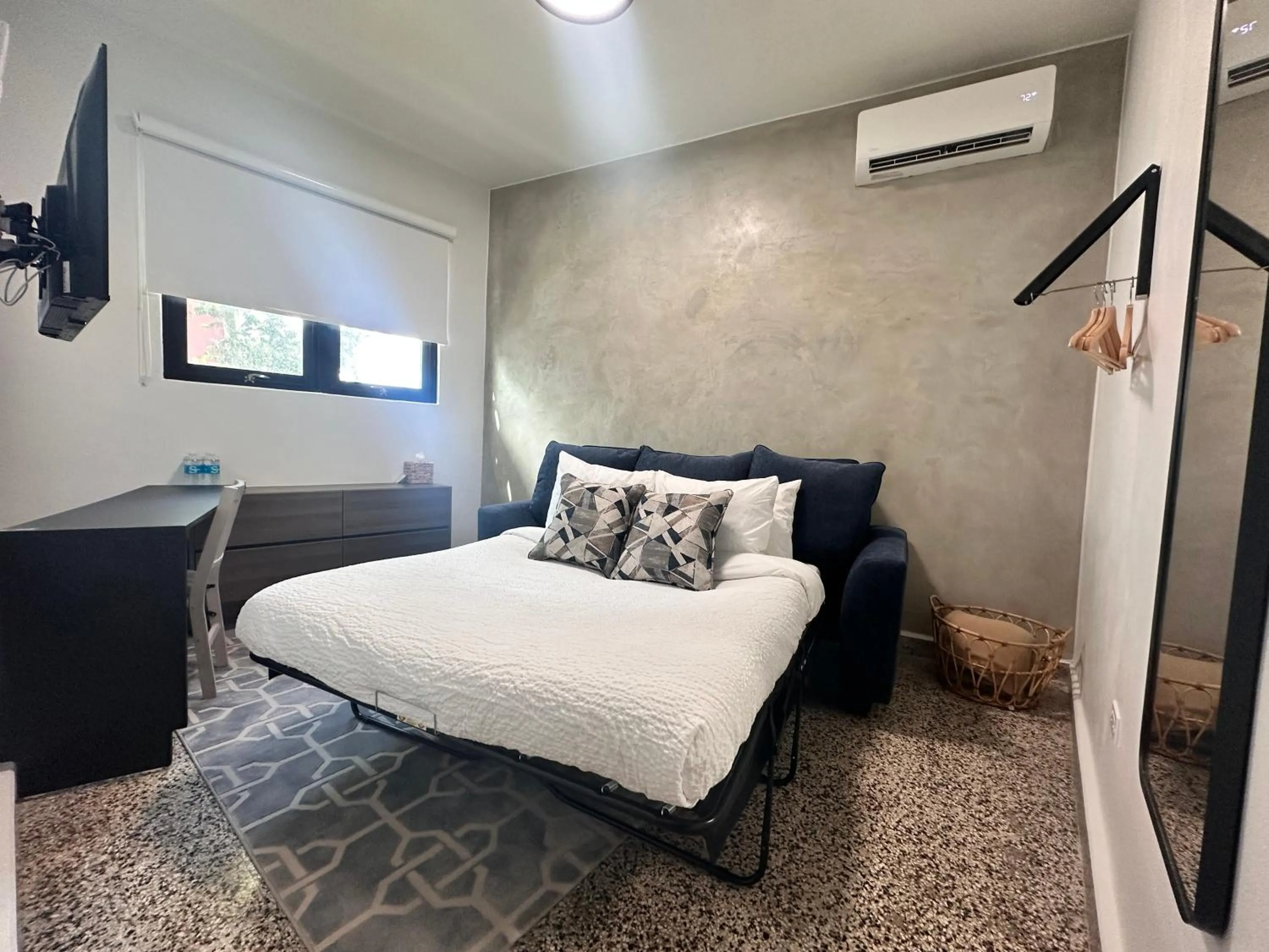 Living room, Bed in The Looking Glass Hotel