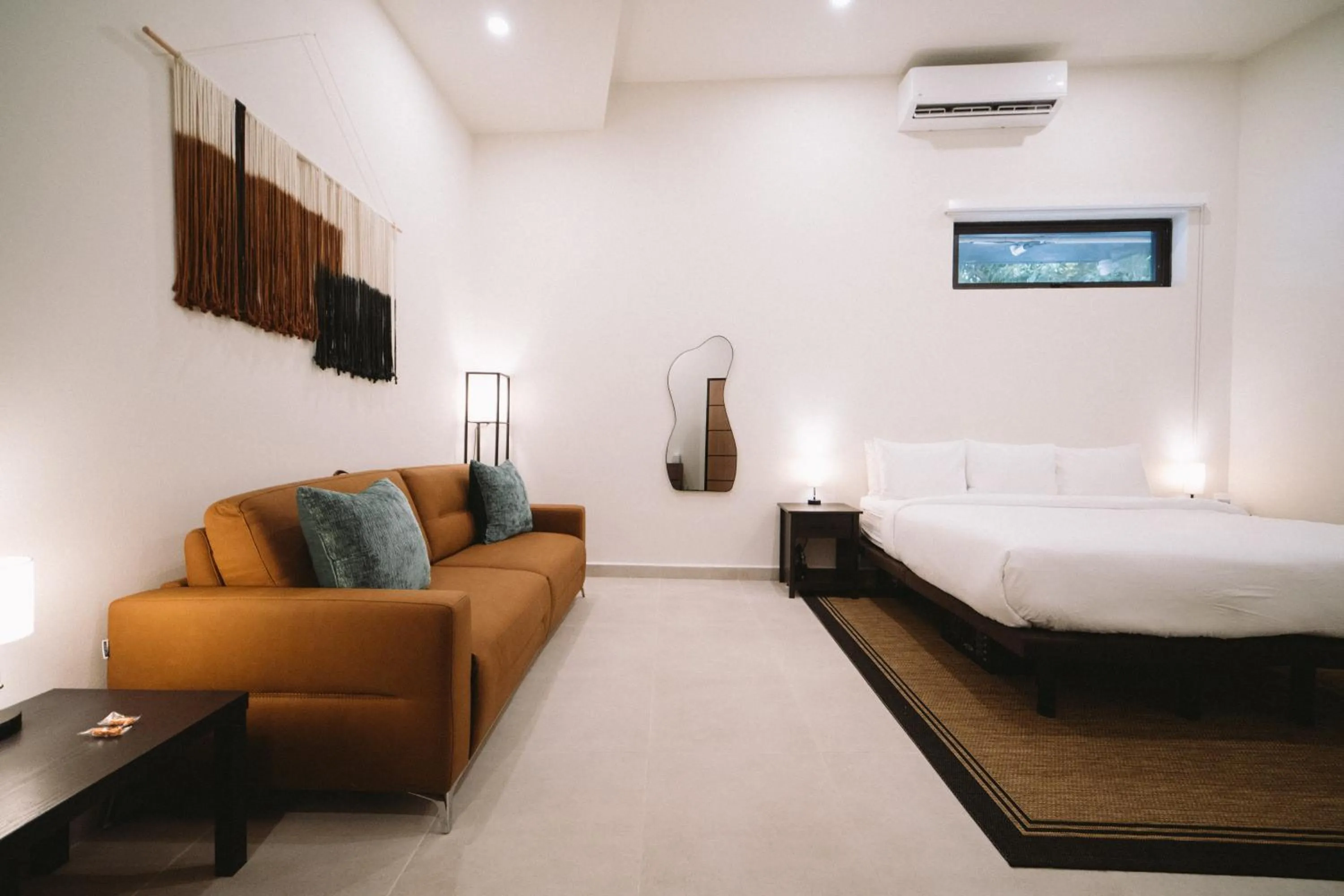 Living room, Bed in The Looking Glass Hotel