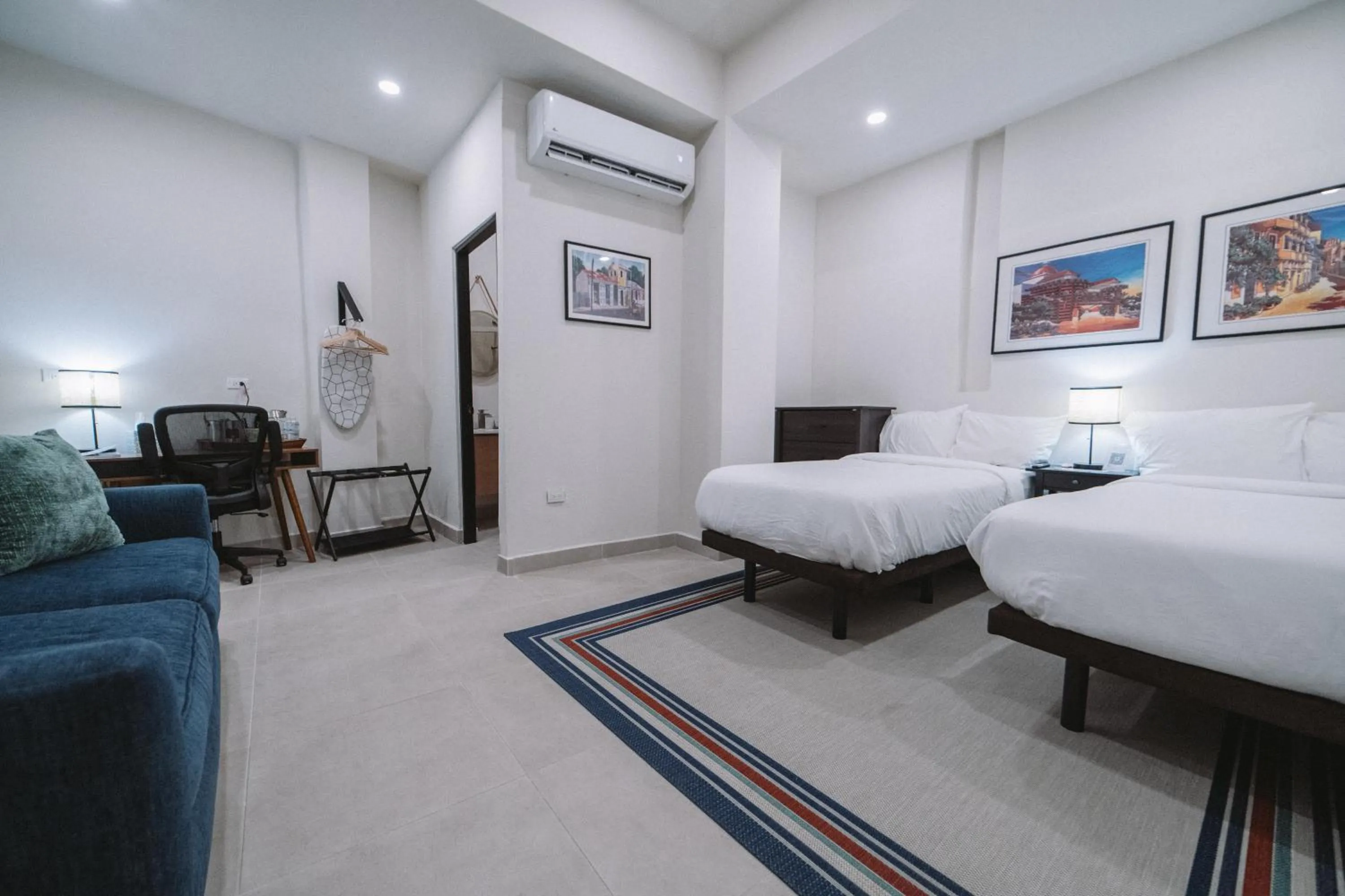 Bed in The Looking Glass Hotel