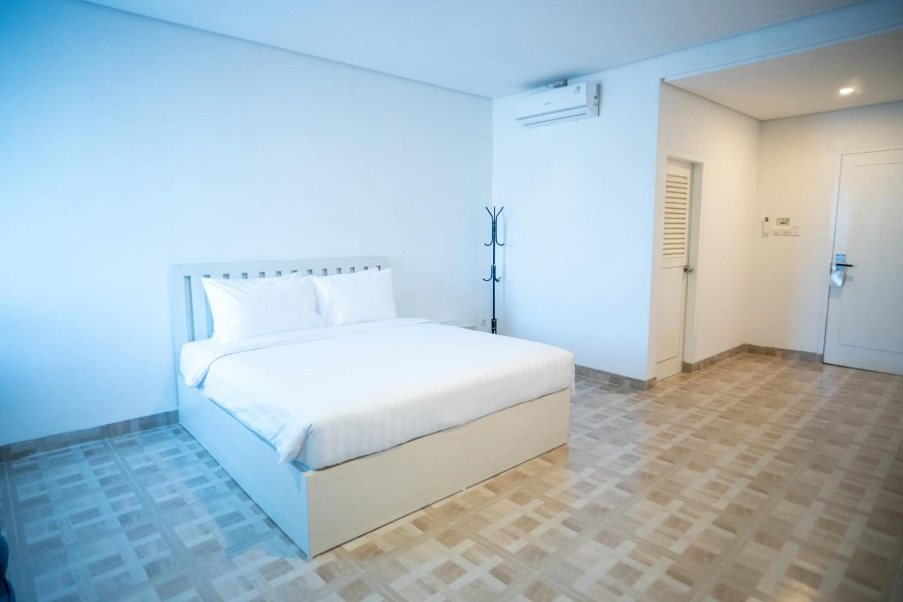 Bed in Elephant Inn and Suite by Sajiwa