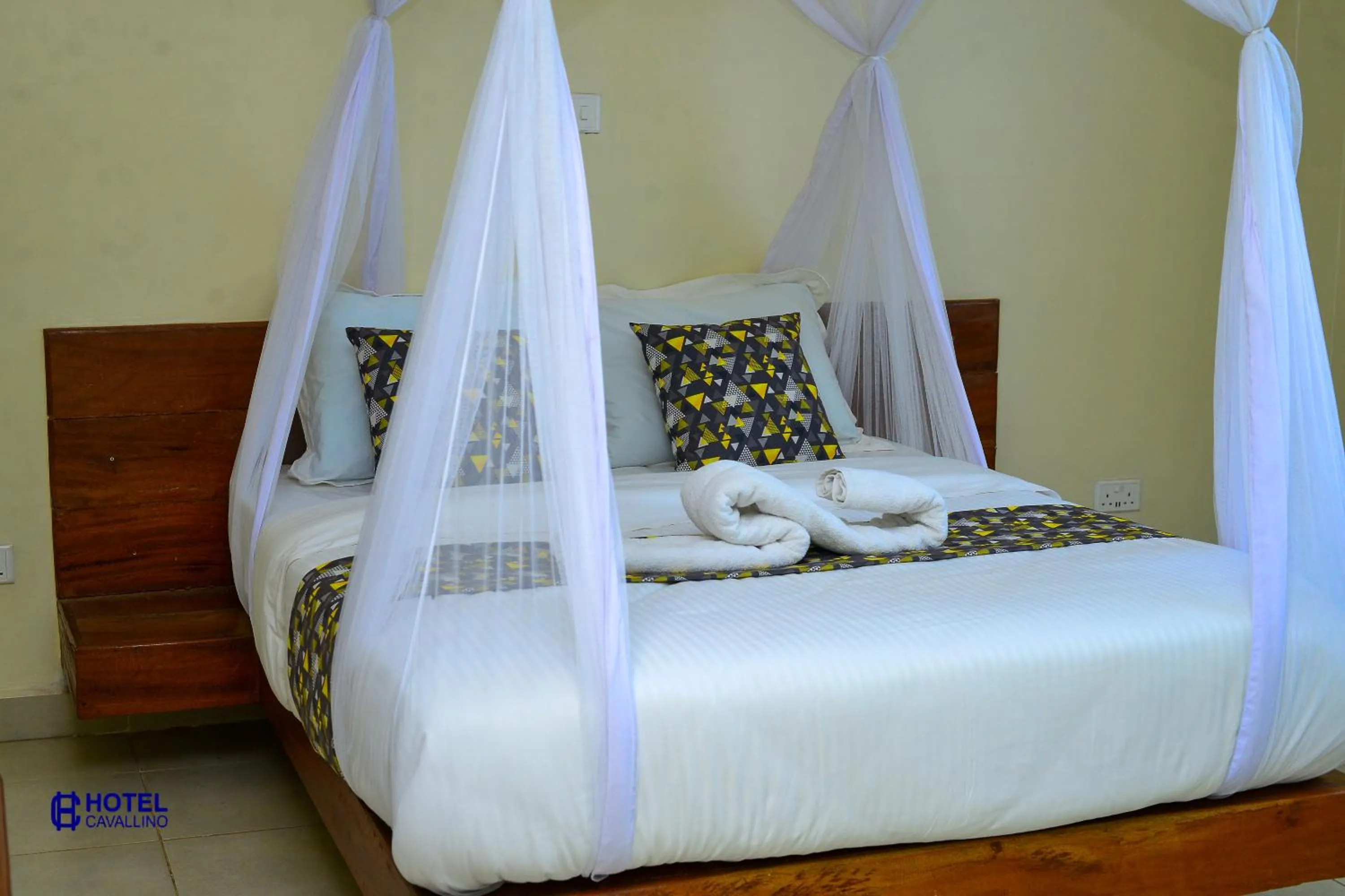 Bed in Hotel Cavallino