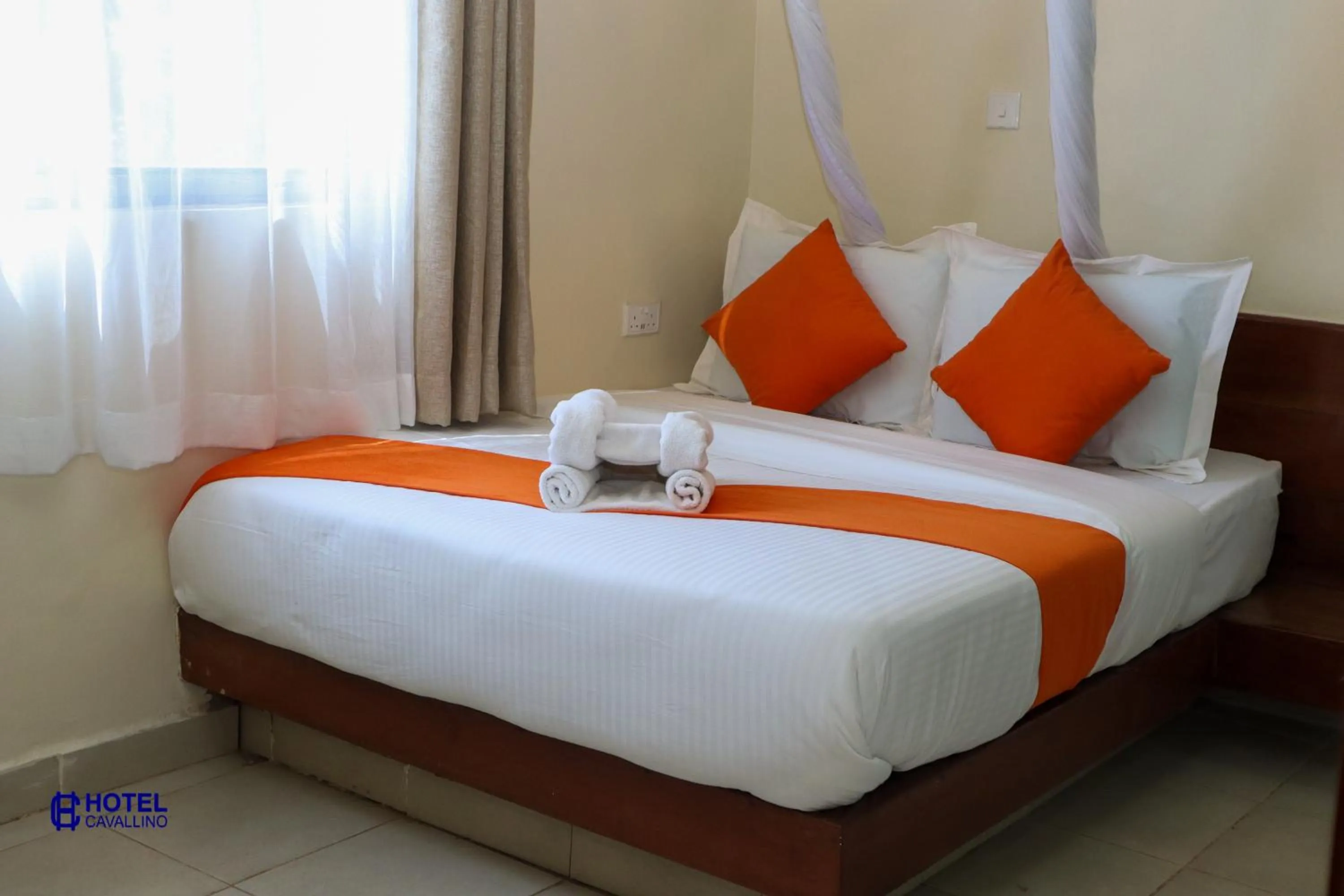 Bed in Hotel Cavallino