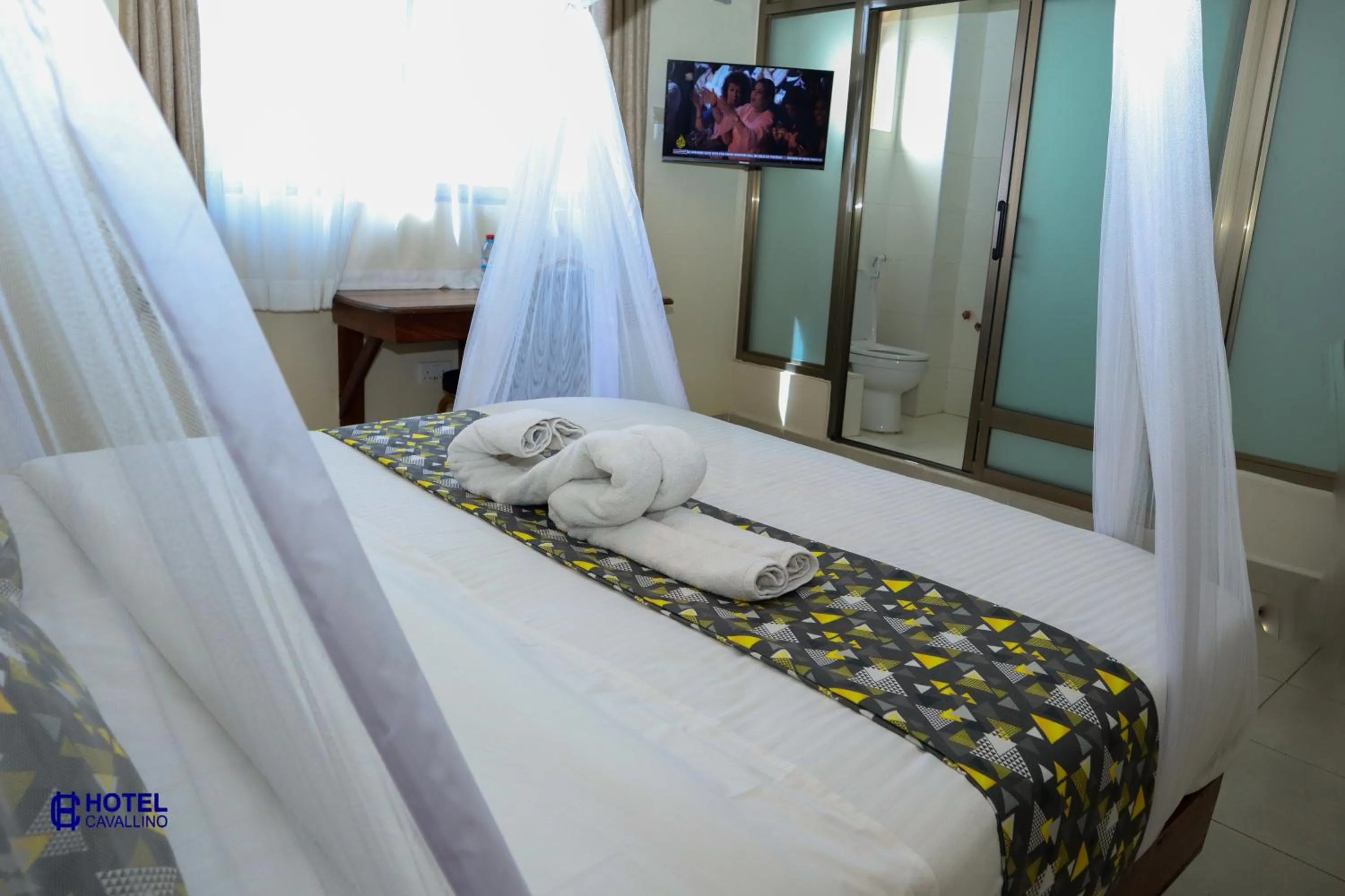 Bed in Hotel Cavallino