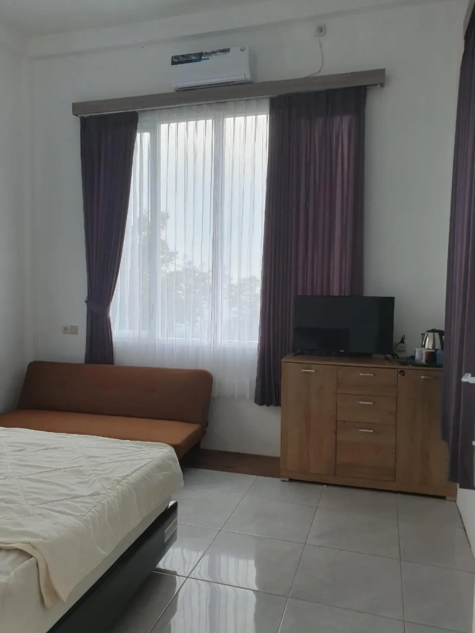 Bed in NK Villa Syariah And Cafe Prigen