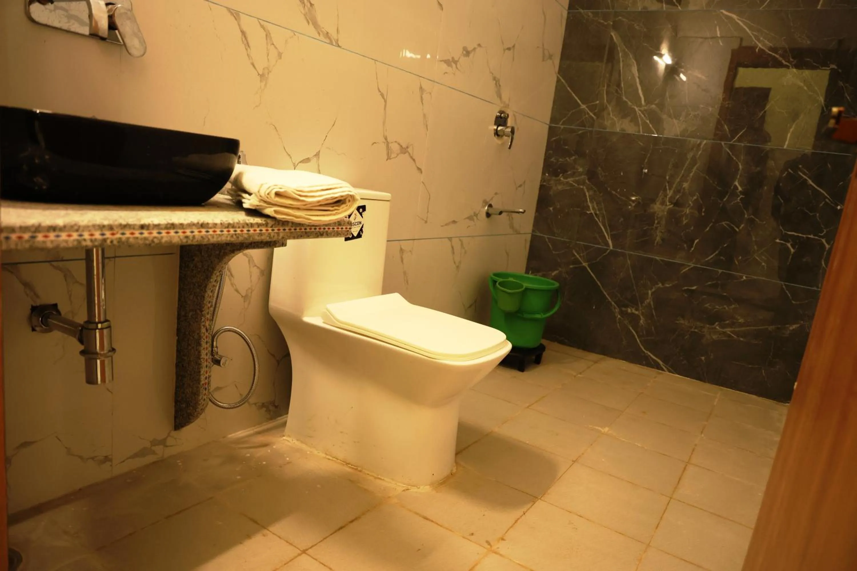 Shower in Savitri Valley Resort A Luxury Resort