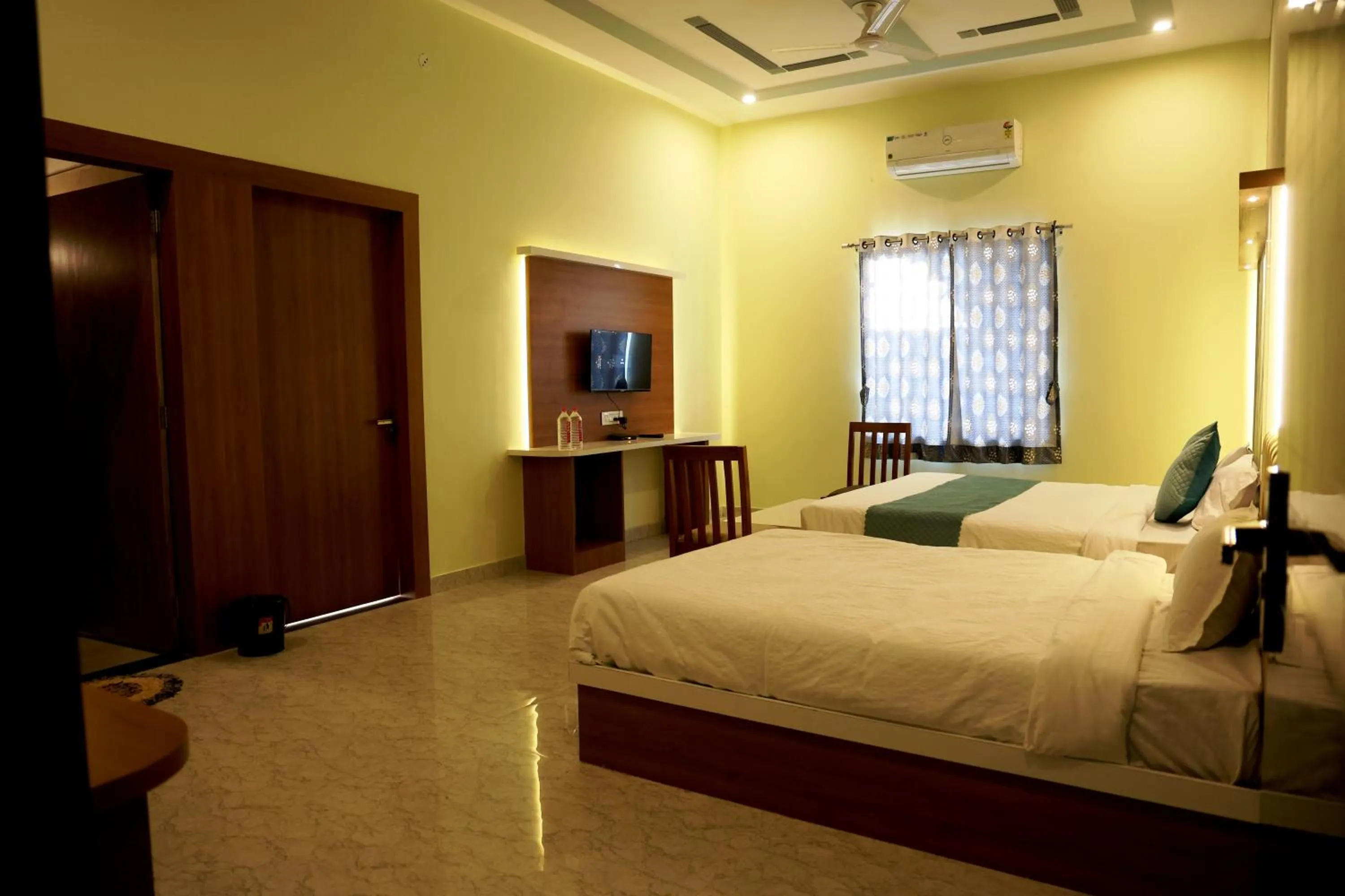 Bed in Savitri Valley Resort A Luxury Resort