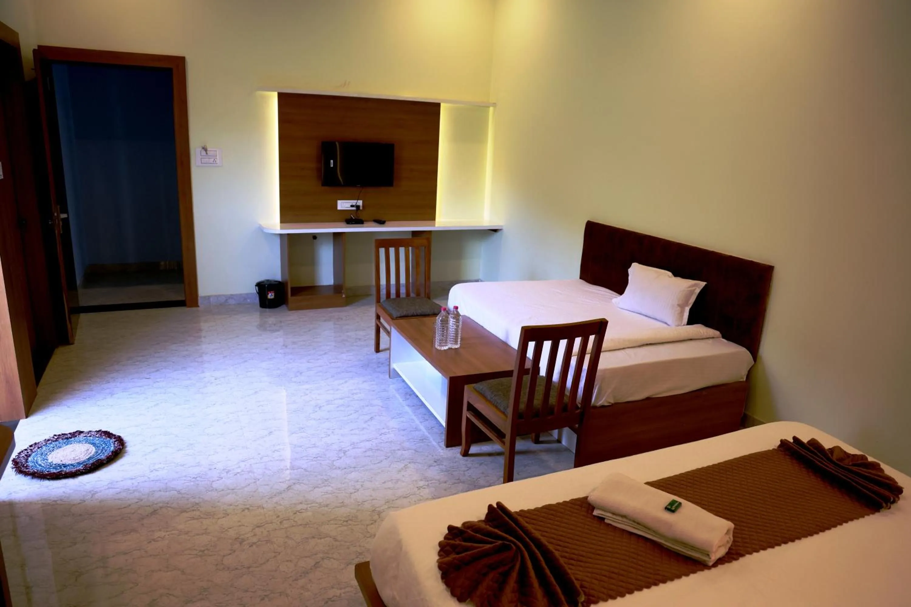 Bed in Savitri Valley Resort A Luxury Resort