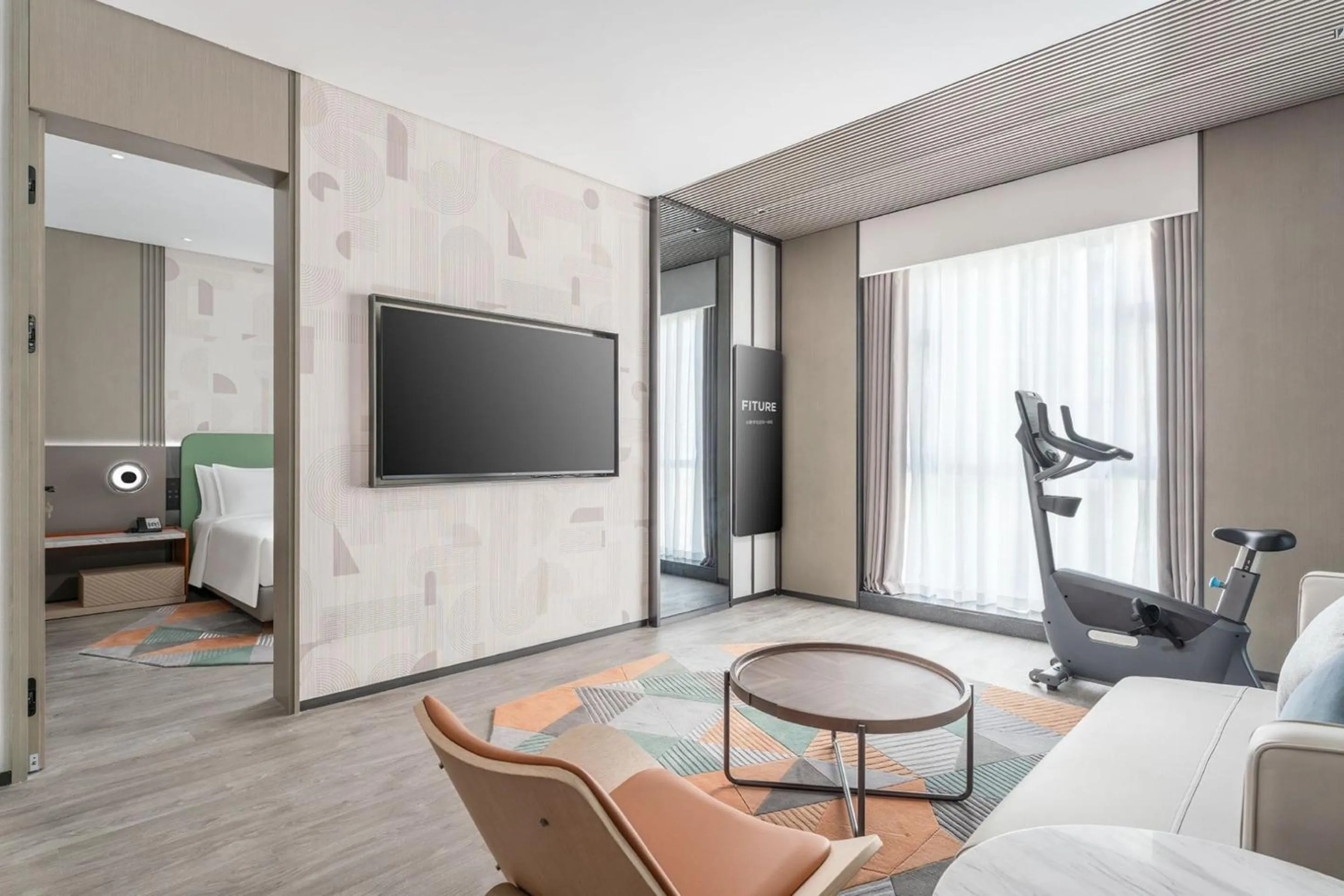 Living room in EVEN Hotel Zhongshan City Center by IHG