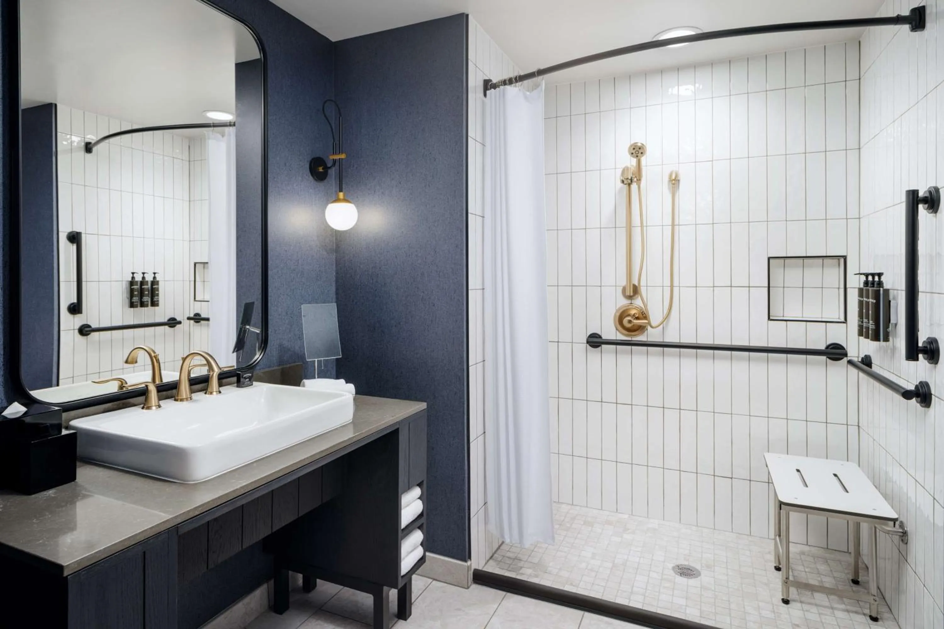 Shower in The Hoffmann Hotel Basalt Aspen Tapestry Collection Hilton