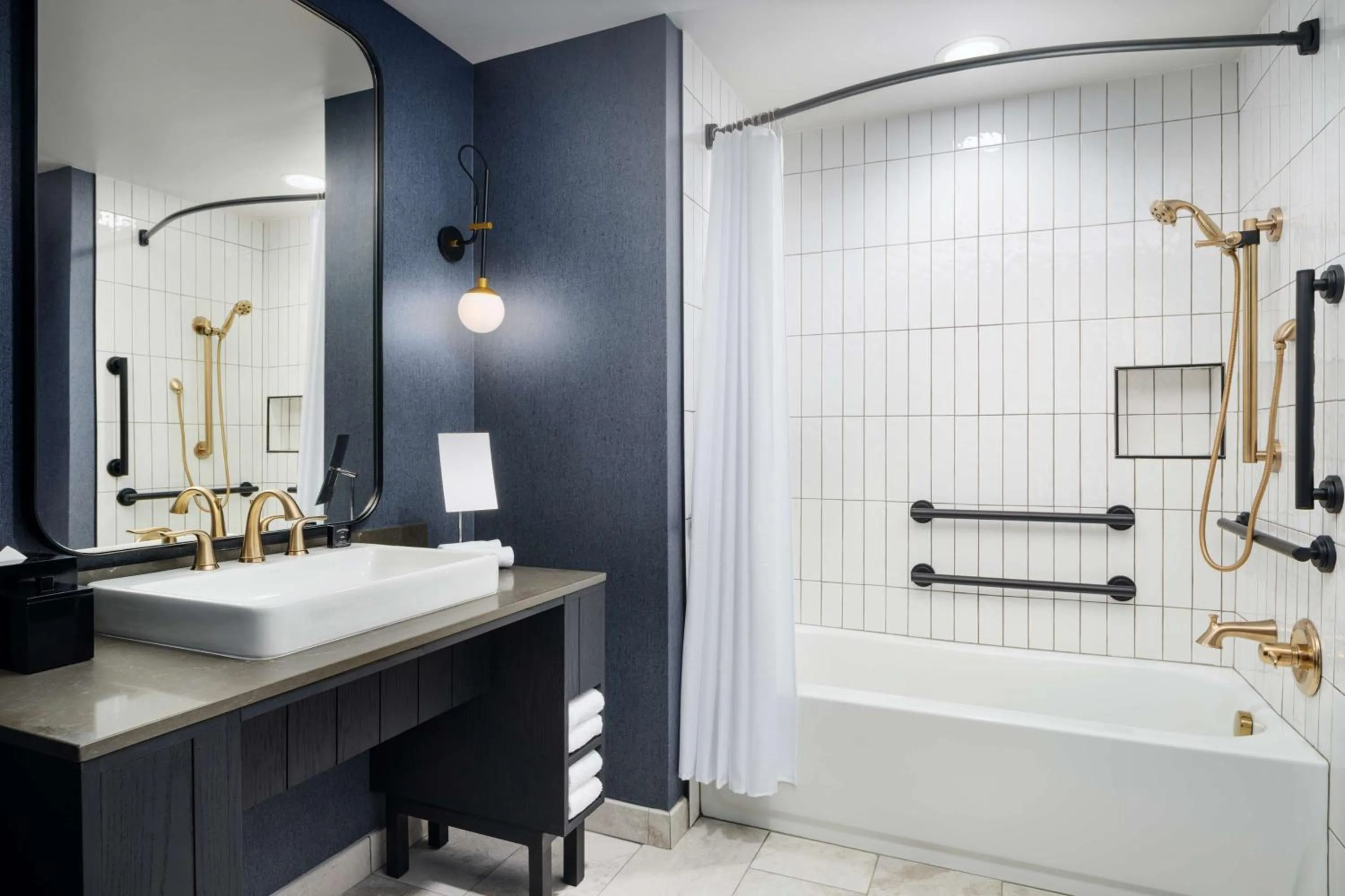 Bathroom in The Hoffmann Hotel Basalt Aspen Tapestry Collection Hilton