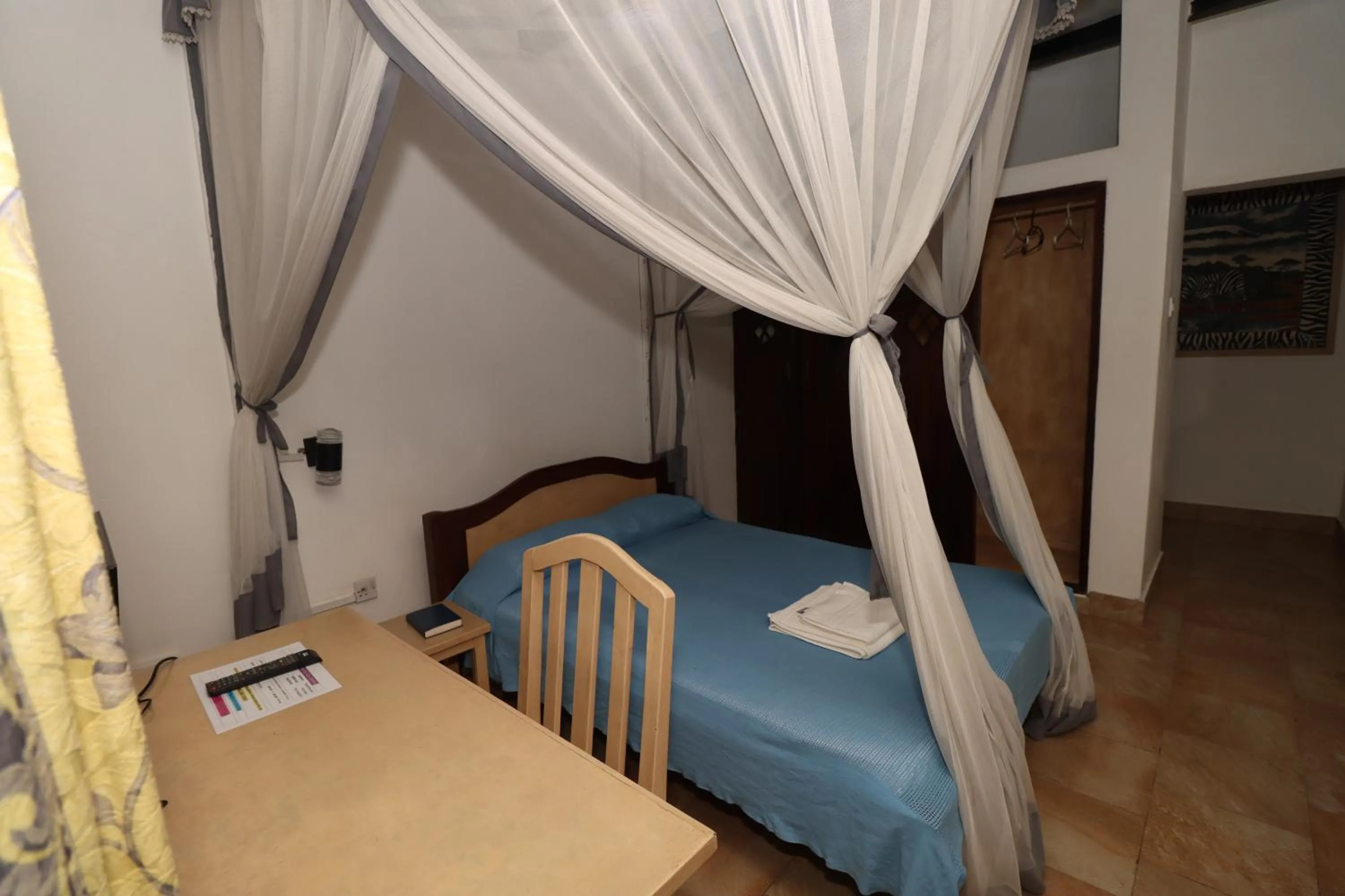 Bed in Makuti Villas Resort