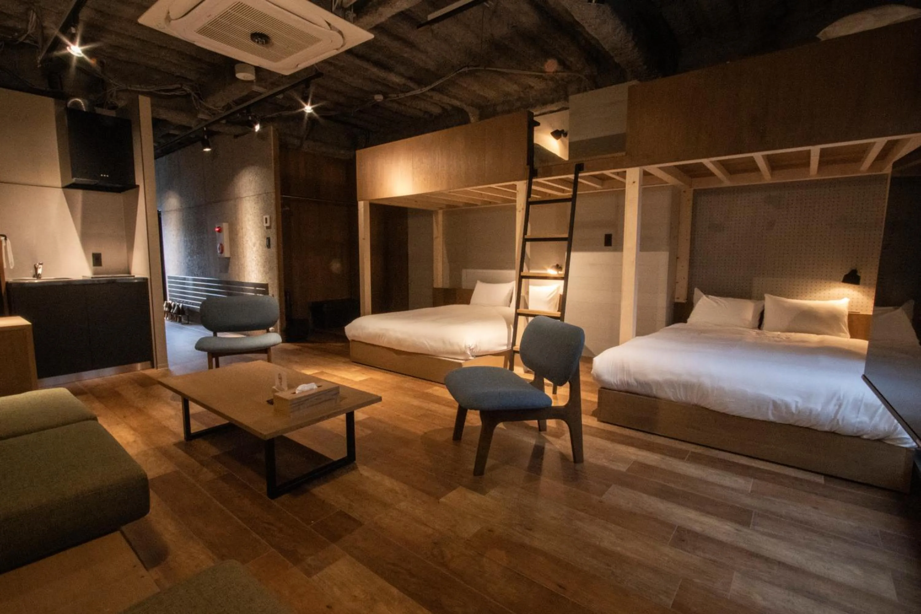 Seating area, Bed in Green Room Hotel