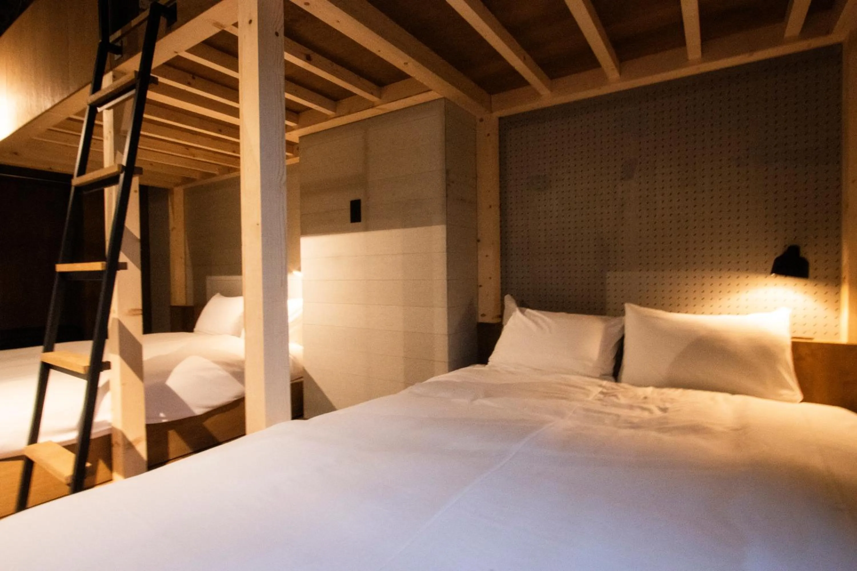 Bed in Green Room Hotel