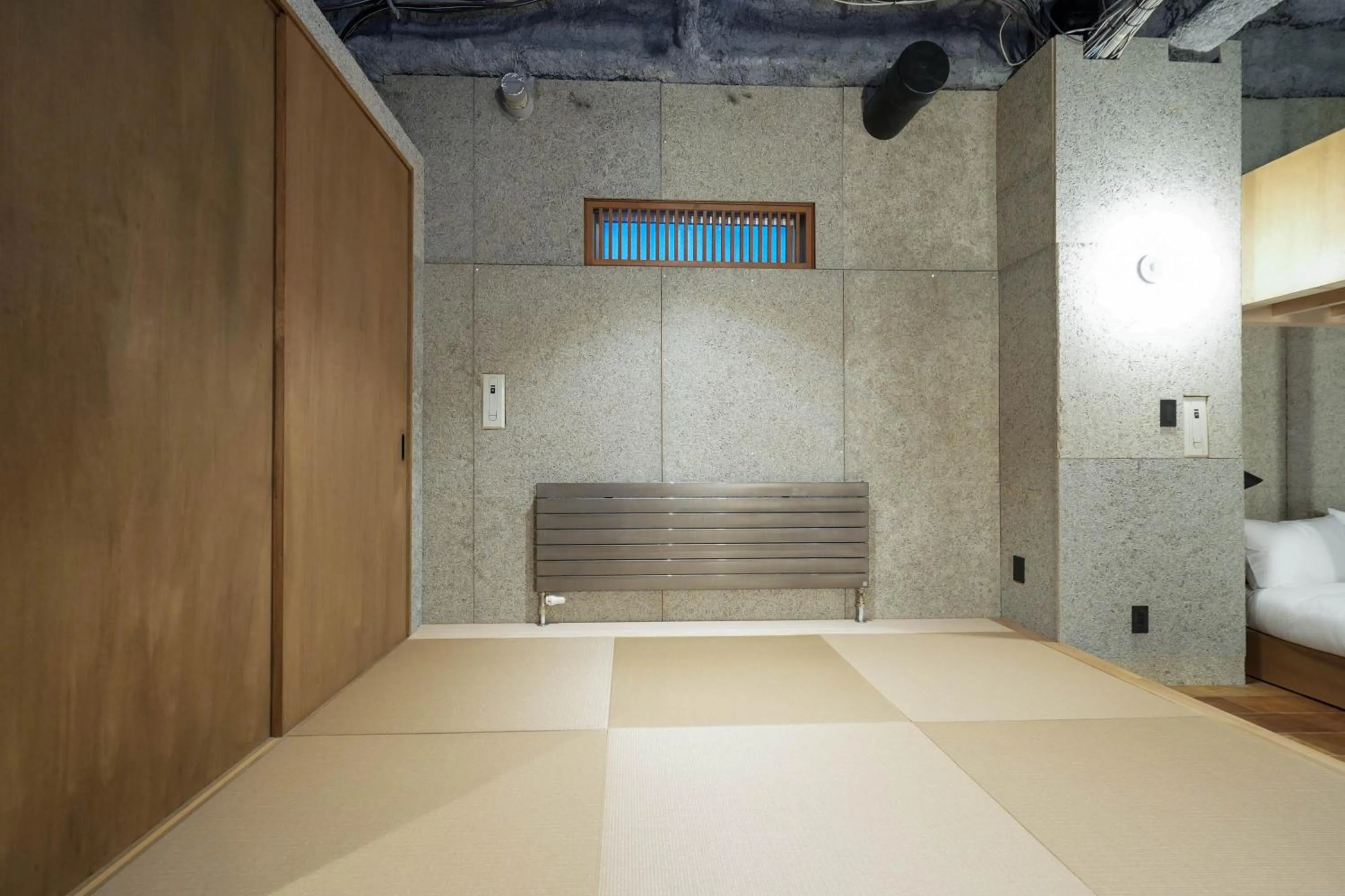 Bed in Green Room Hotel