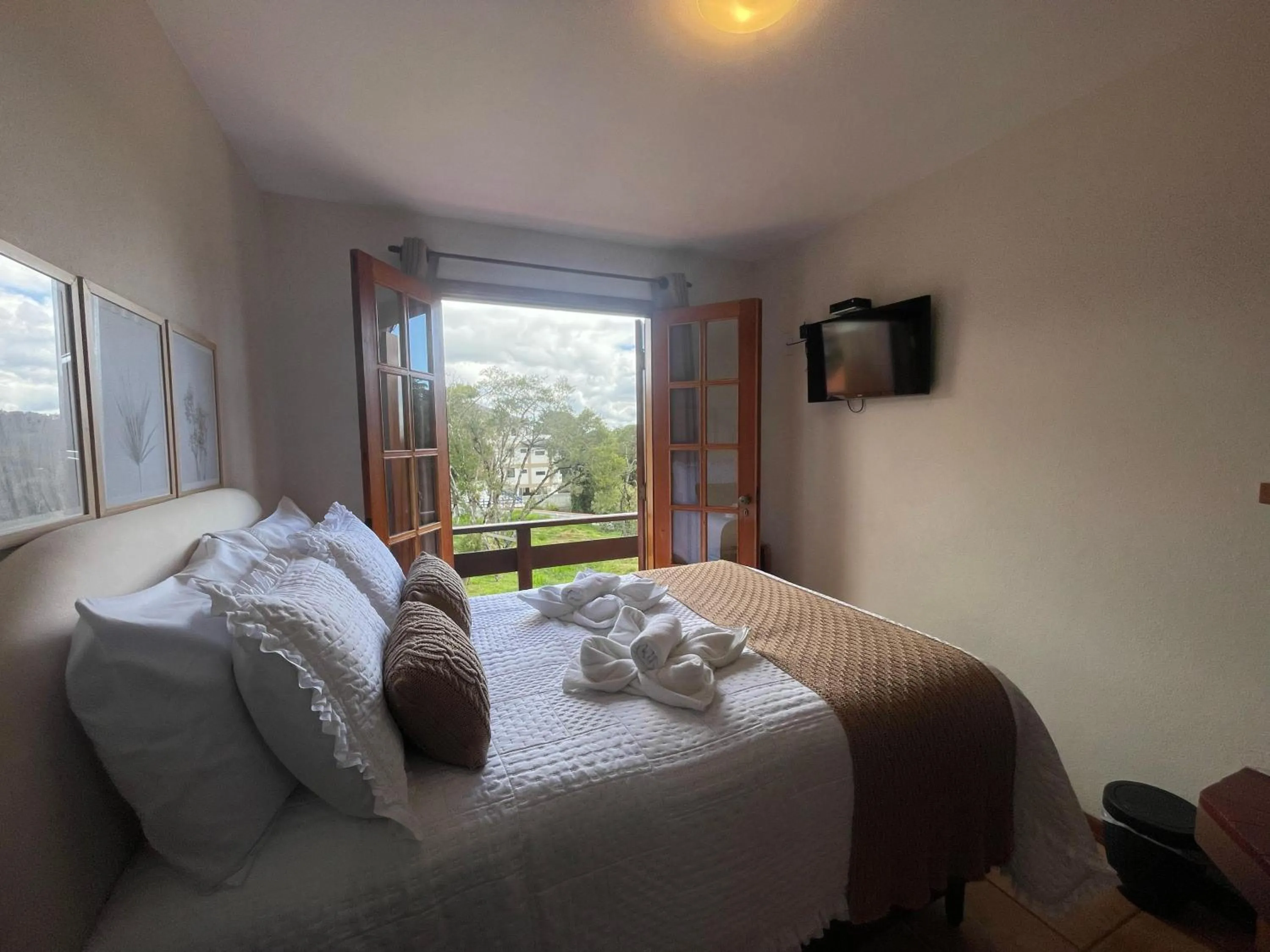 Bed in Pousada Flor de Lua Monte Verde